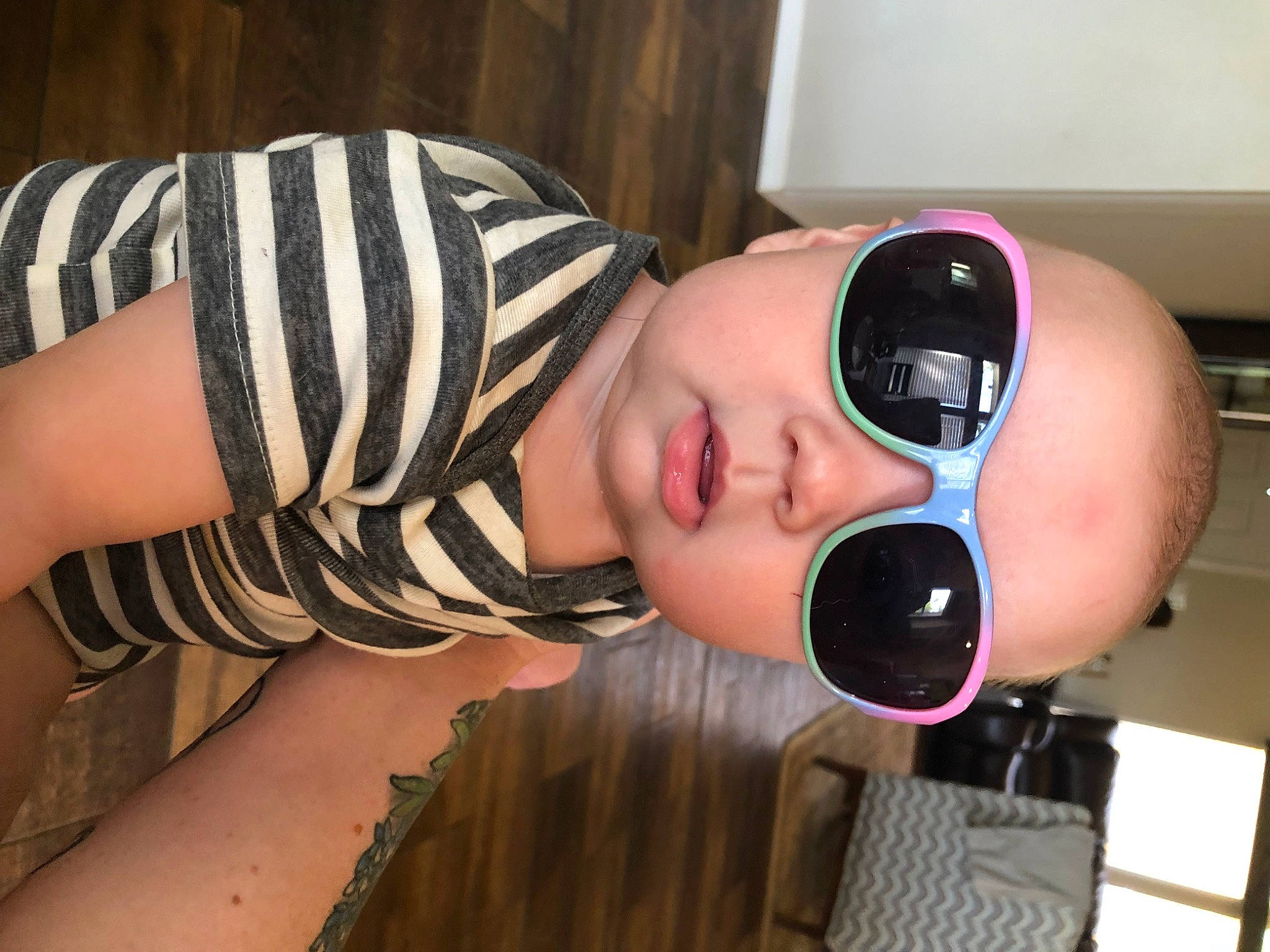 Hunter is registered to the contest to win money with this photo: audio_equipment, beauty, black_hair, cool, eyelash, eyewear, fun, gadget, glasses, goggles, human_leg, nail, neck, nose, person, personal_protective_equipment, sunglasses, thigh, toddler, vision_care