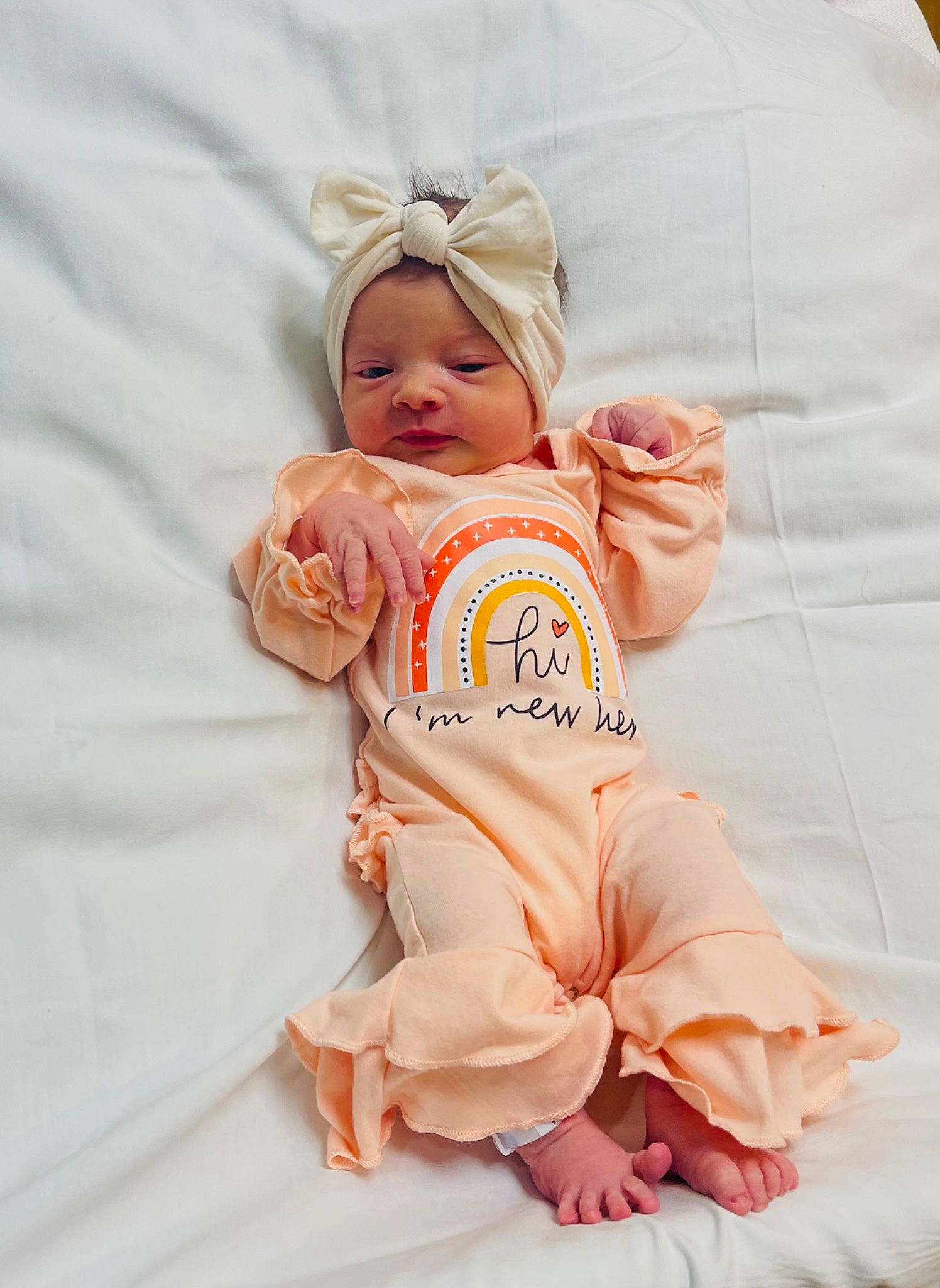 Rylee is registered to the contest to win money with this photo: baby, baby_sleeping, baby_toddler_clothing, barefoot, child, comfort, face, finger, foot, happy, hat, linens, peach, person, portrait_photography, sitting, sleeve, thumb, toddler