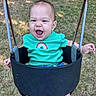baby, child, infant, swing, playground, outdoor, grass, smiling, laughing, portrait, turquoise_shirt, rainbow, sitting, happy, open_mouth, face, hands, summer, daylight, playtime