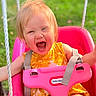 toddler, child, swing, pink_swing, outdoor, grass, happy, smiling, yellow_dress, sunny, daylight, playground, person, face, baby, summer, fun, joy, seat, rope