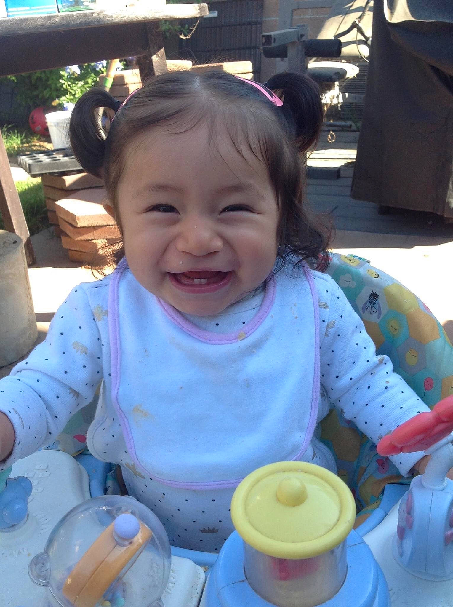 Kamaria is registered to the contest to win money with this photo: baby, baby_toddler_clothing, child, cup, drink, drinkware, event, fun, happy, joy, leisure, person, product, recreation, serveware, sitting, skin, smile, snapshot, tableware