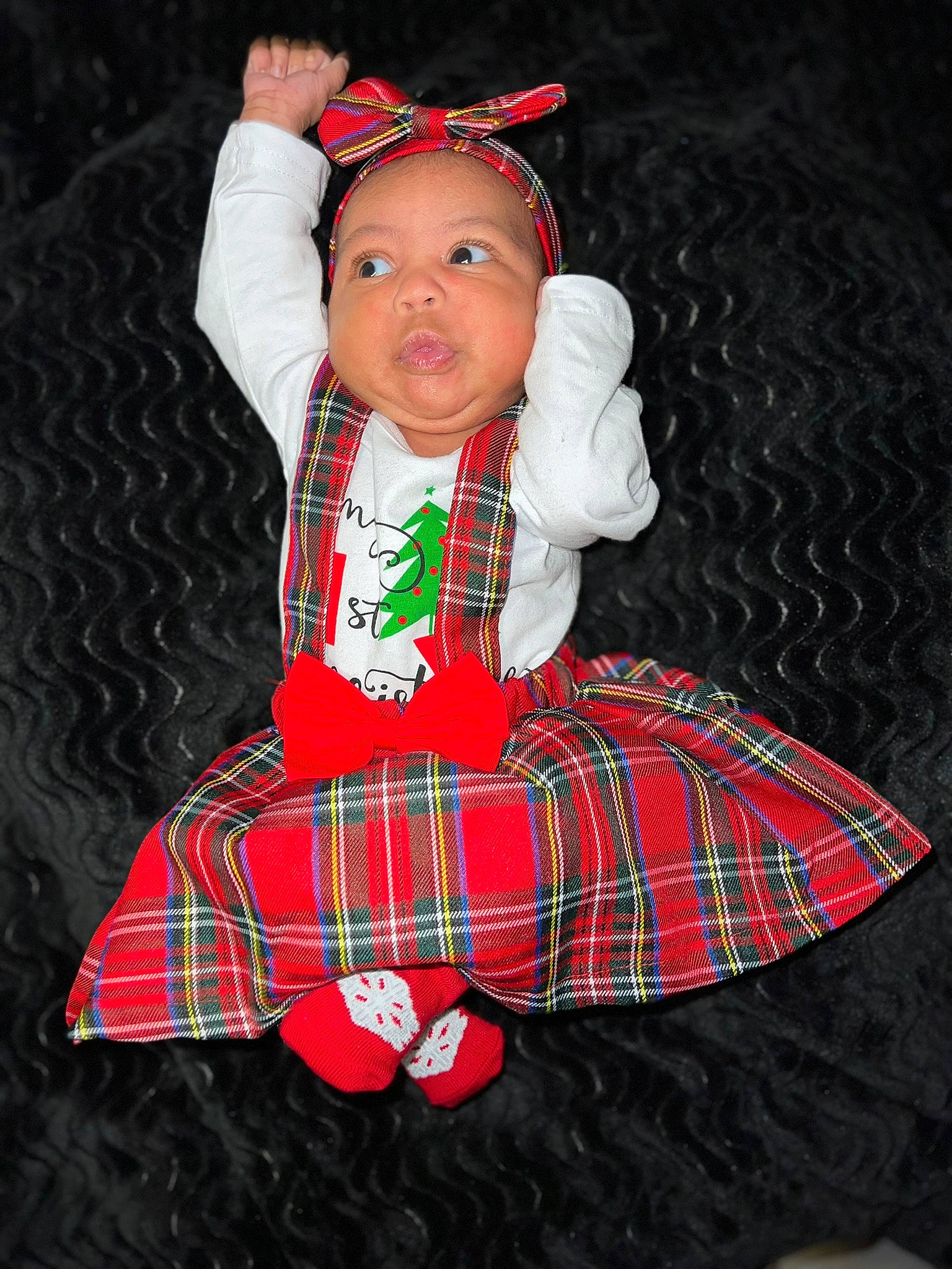 Kyori is registered to the contest to win money with this photo: baby, baby_toddler_clothing, carmine, collar, costume, costume_hat, design, doll, event, fur, headwear, holiday, linens, pattern, person, plaid, sitting, sleeve, tartan, textile