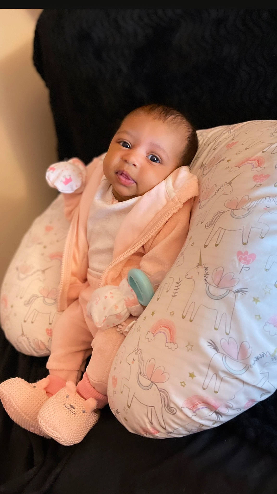 Kyori is registered to the contest to win money with this photo: arm, baby, baby_toddler_clothing, cheek, child, comfort, finger, flash_photography, foot, happy, head, linens, peach, person, pink, product, sitting, skin, sleeve, textile