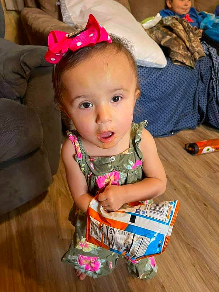 Blessence is registered to the contest to win money with this photo: baby, baby_toddler_clothing, child, event, fashion_accessory, flooring, fun, happy, hardwood, headband, headwear, iris, magenta, person, pink, room, sitting, skin, toddler, varnish