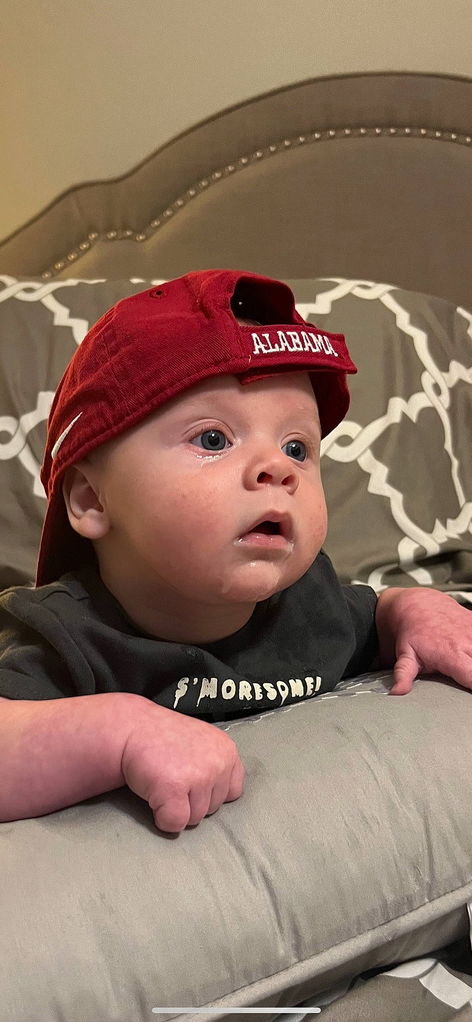 Baylor is registered to the contest to win money with this photo: baby, baby_toddler_clothing, baseball_cap, cap, carmine, cheek, child, cool, eyebrow, fashion_accessory, flash_photography, fun, happy, headgear, headwear, lip, person, personal_protective_equipment, portrait_photography, skin