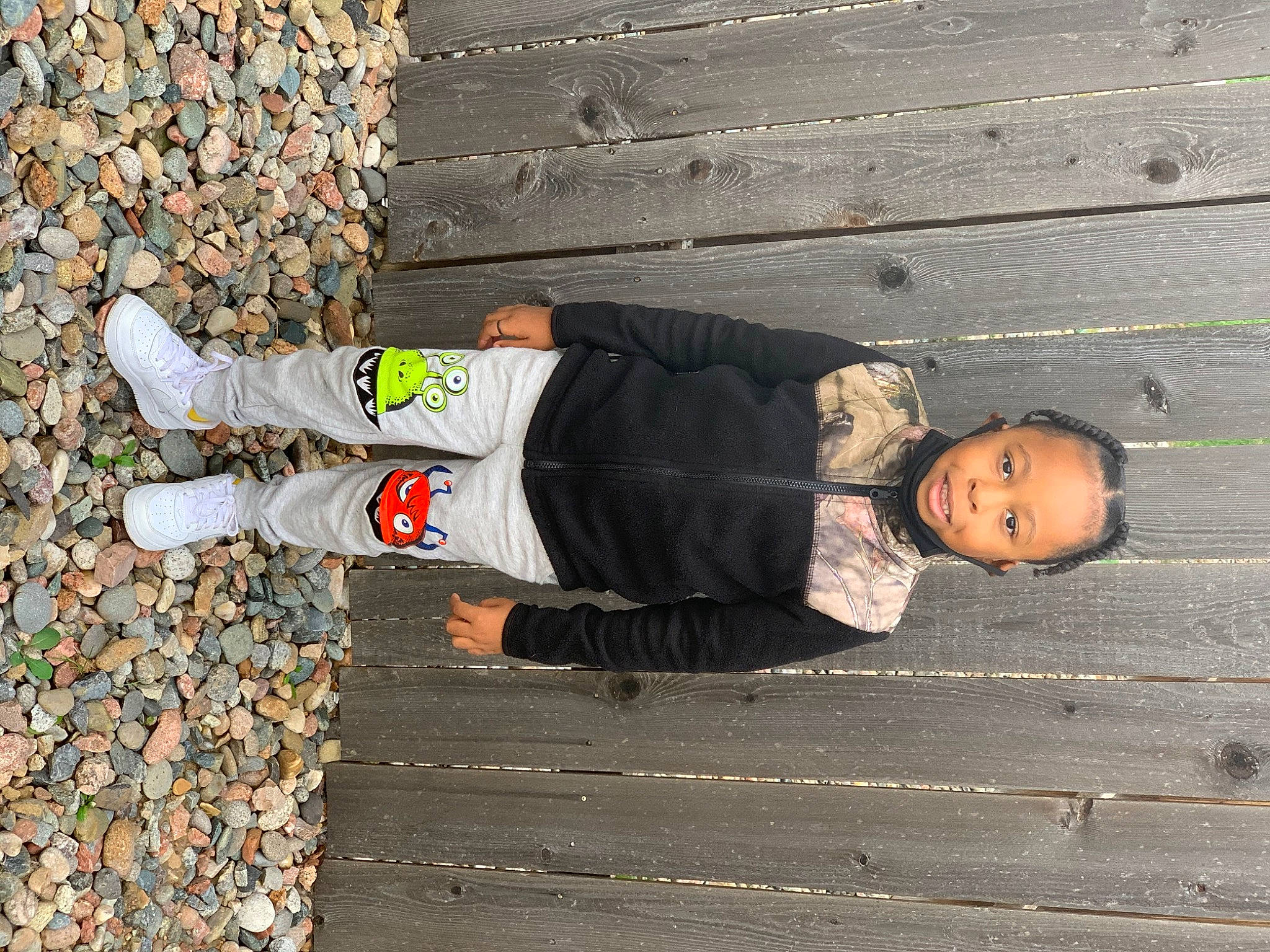 Jayden joined the competition — help win amazing prizes! asphalt, cobblestone, concrete, flooring, human_leg, outdoor_shoe, pedestrian, person, road, road_surface, shadow, shoe, sidewalk, sitting, soil, street, tints_and_shades, walking_shoe, wall, wood