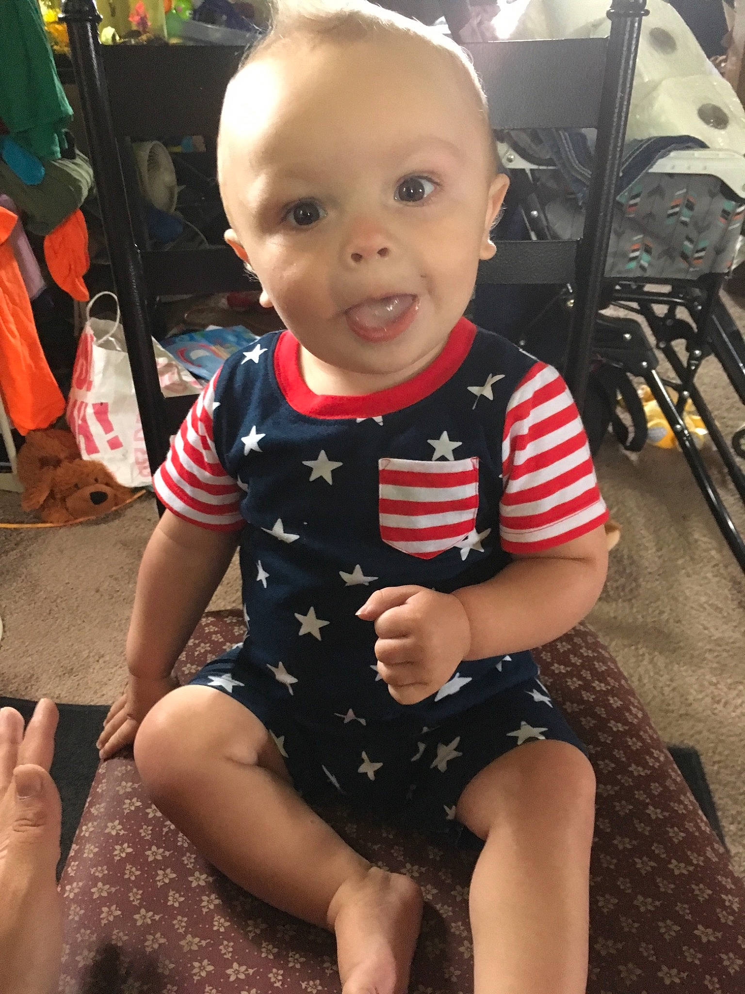 Dawson is registered to the contest to win money with this photo: baby, child, head, leg, person, sitting, smile, thigh, toddler