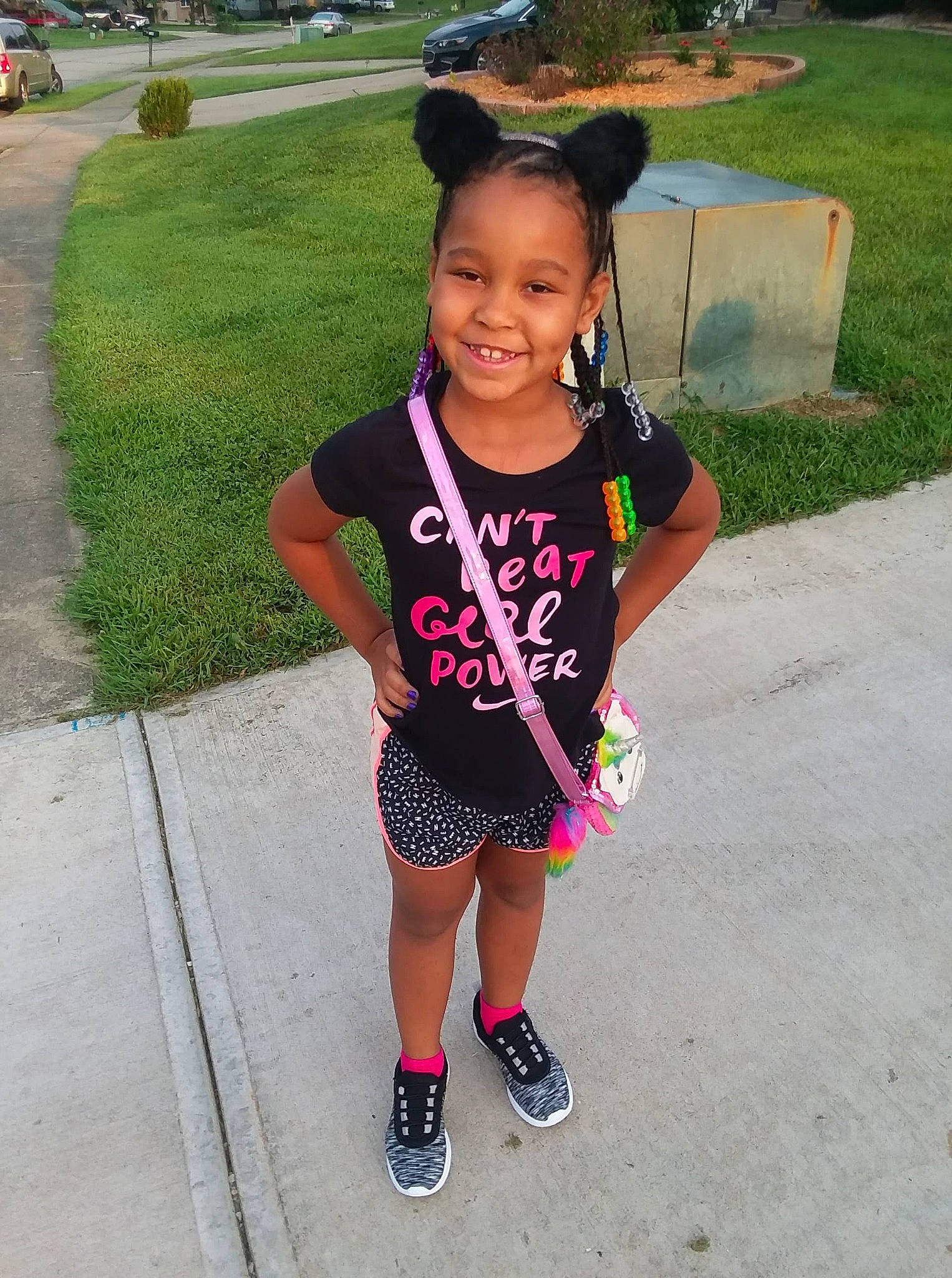 Ke'Onna is registered to the contest to win money with this photo: abdomen, child, cool, day, facial_expression, footwear, fun, girl, joy, pattern, person, pink, product, recreation, shoe, shorts, shoulder, smile, snapshot, summer