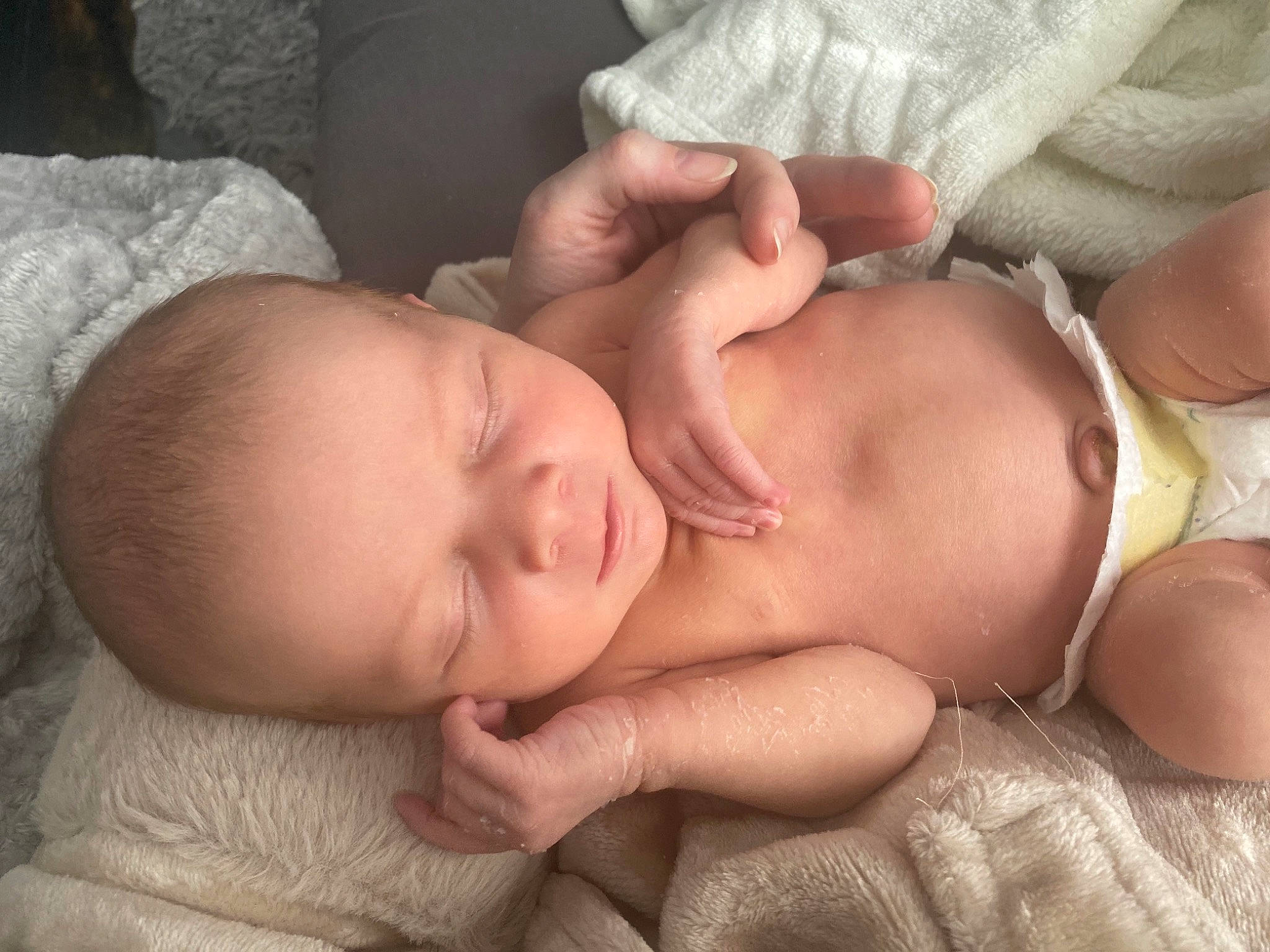 Beaux is registered to the contest to win money with this photo: abdomen, baby, baby_toddler_clothing, cheek, chest, child, comfort, event, eye, finger, grass, hand, human_body, mouth, muscle, nail, person, room, skin, thumb