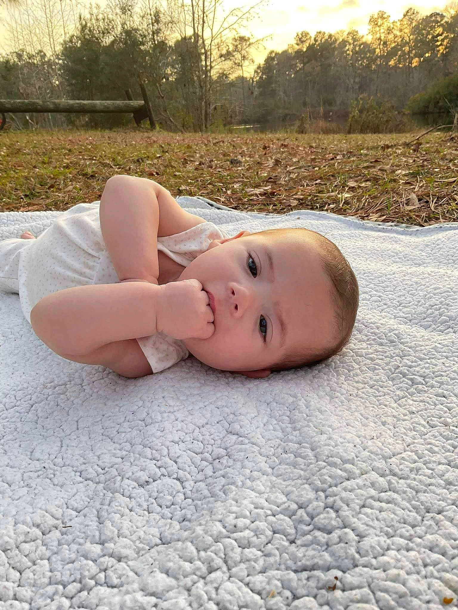 Neveah joined the competition — help win amazing prizes! asphalt, baby, eye, face, flash_photography, flooring, grass, head, human_body, leg, leisure, morning, people_in_nature, person, plant, road_surface, skin, sky, toddler, tree