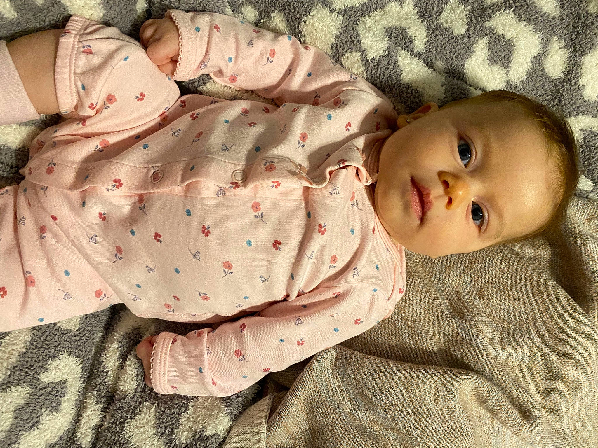 Emerson is registered to the contest to win money with this photo: baby, baby_products, baby_sleeping, baby_toddler_clothing, bedding, cheek, child, comfort, eye, eyelash, fur, human_body, linens, lip, nose, pattern, person, sitting, skin, sleeve