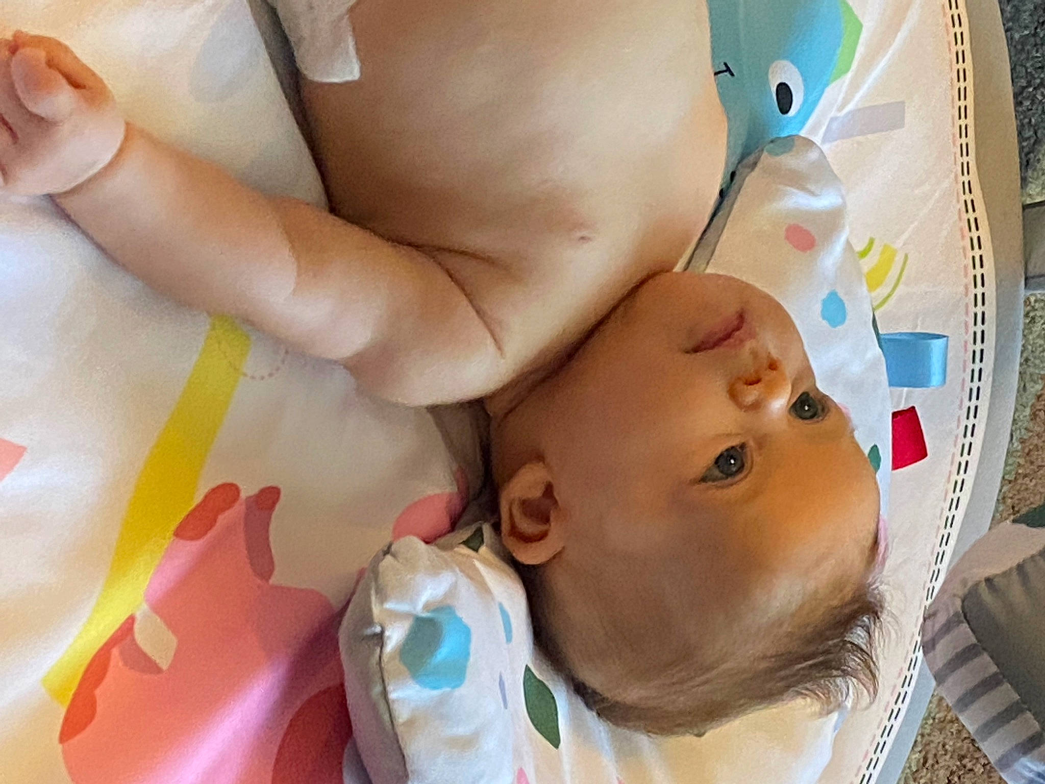 Emerson is registered to the contest to win money with this photo: abdomen, baby, baby_products, baby_safety, baby_toddler_clothing, cheek, chest, child, comfort, finger, fun, happy, human_leg, mouth, nail, person, product, room, skin, thumb