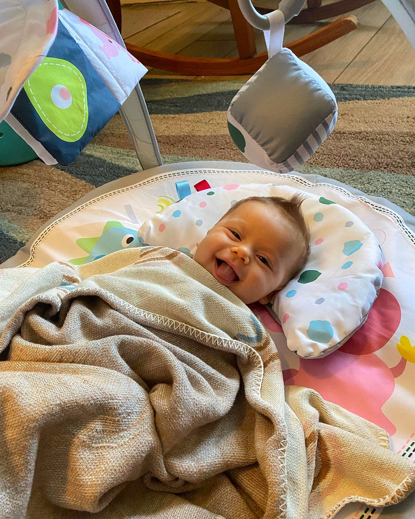 Emerson joined the competition — help win amazing prizes! baby, baby_products, baby_safety, baby_toddler_clothing, bed_sheet, bedding, bedtime, chair, child, comfort, flooring, linens, nap, person, room, sleep, smile, textile, toddler, white