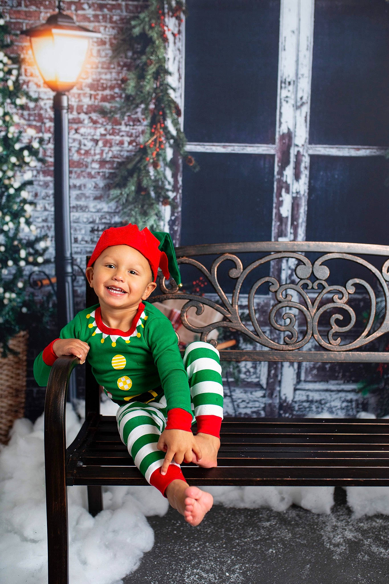 Camren joined the competition — help win amazing prizes! child, child_model, christmas, christmas_eve, fictional_character, fun, green, headwear, holiday, joy, person, red, smile, snow, toddler, tree, window, winter