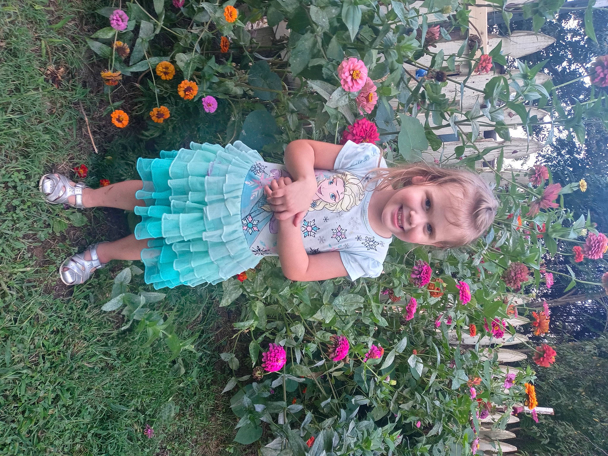 Lillian joined the competition — help win amazing prizes! annual_plant, botany, event, floral_design, flower, flowering_plant, garden, grass, green, happy, joy, magenta, people_in_nature, person, petal, pink, plant, rose, rose_family, shrub