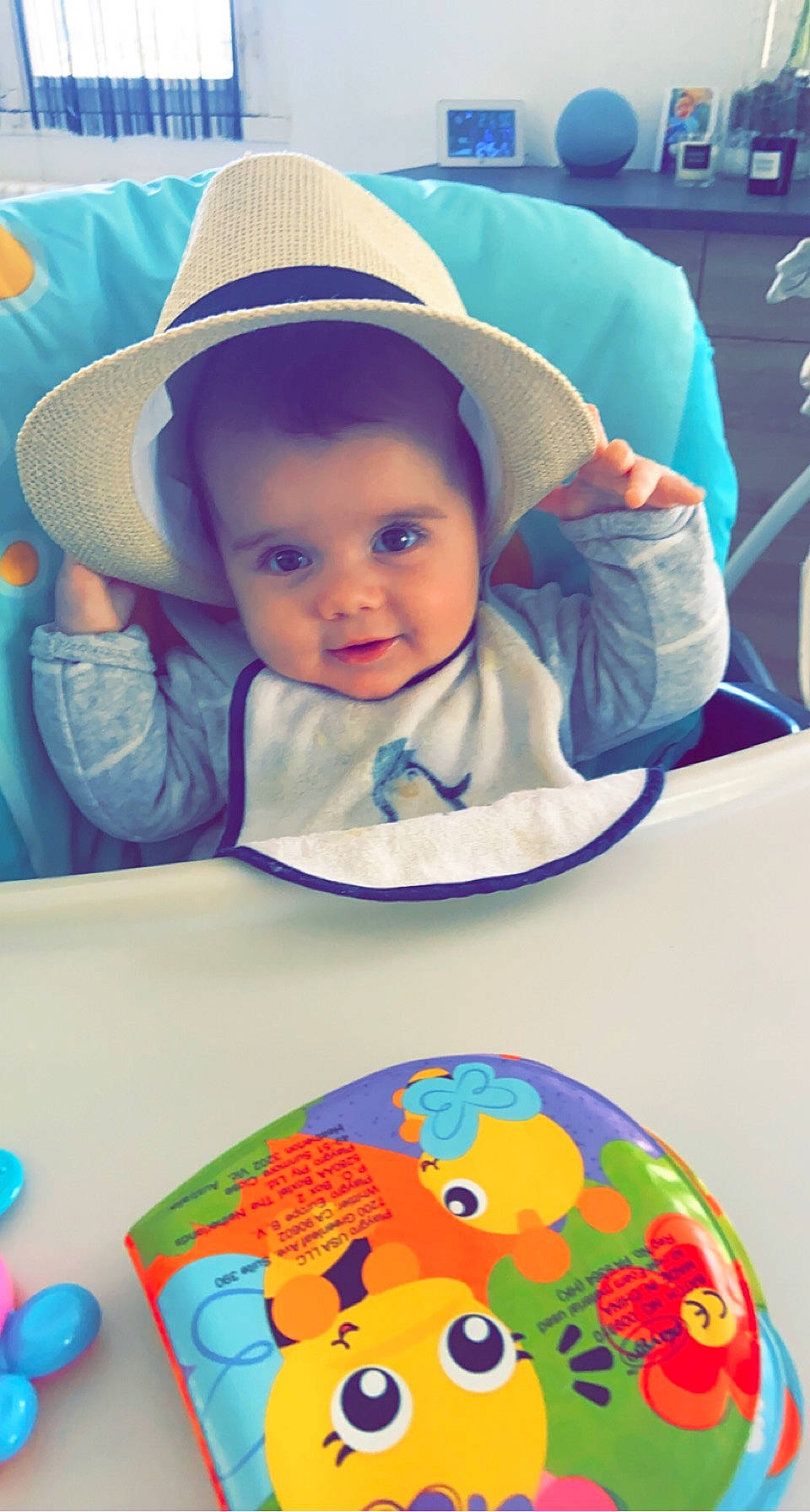 élio participe au concours pour gagner de l'argent avec cette photo : azure, baby, baby_toddler_clothing, blue, cheek, child, eye, face, hairstyle, happy, hat, iris, mouth, person, photograph, product, smile, sun_hat, toddler, white