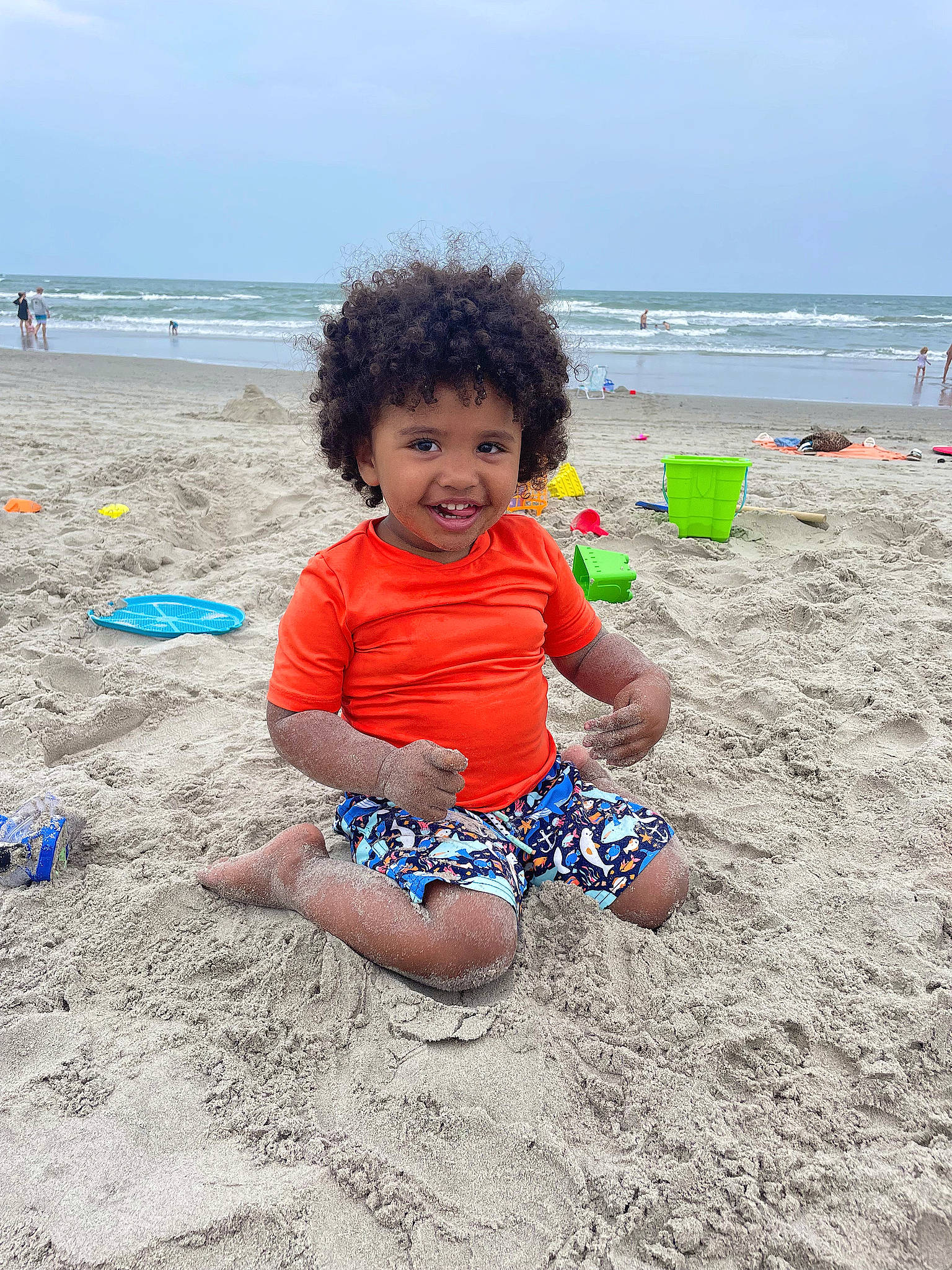Koda is registered to the contest to win money with this photo: beach, child, cloud, coast, fun, happy, holiday, horizon, joy, leisure, ocean, people_on_beach, person, recreation, sand, shore, sky, smile, summer, toddler