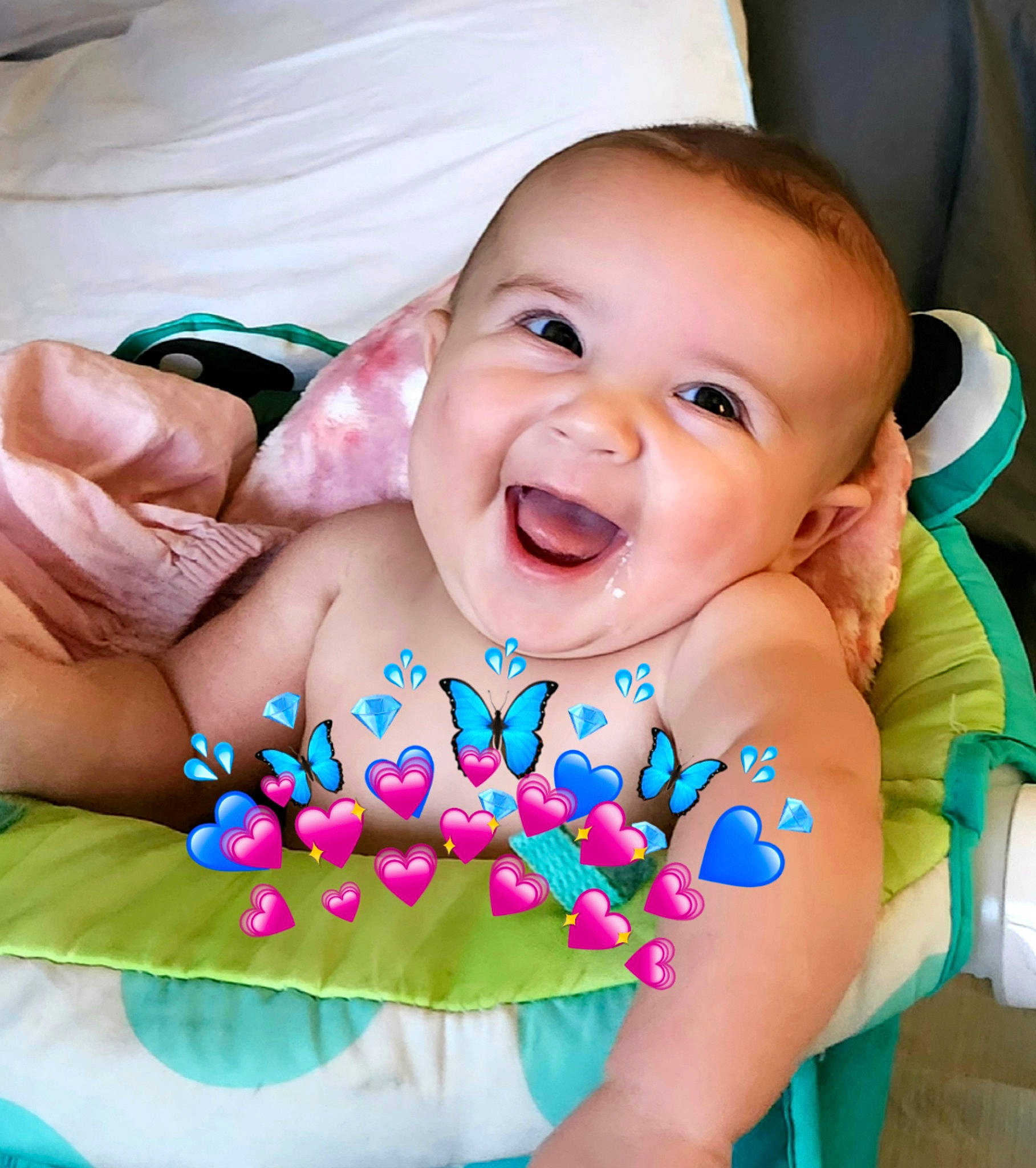 Delilah joined the competition — help win amazing prizes! baby, baby_laughing, baby_products, baby_toddler_clothing, cheek, child, comfort, face, facial_expression, finger, fun, happy, human, joy, pattern, person, pink, product, skin, smile