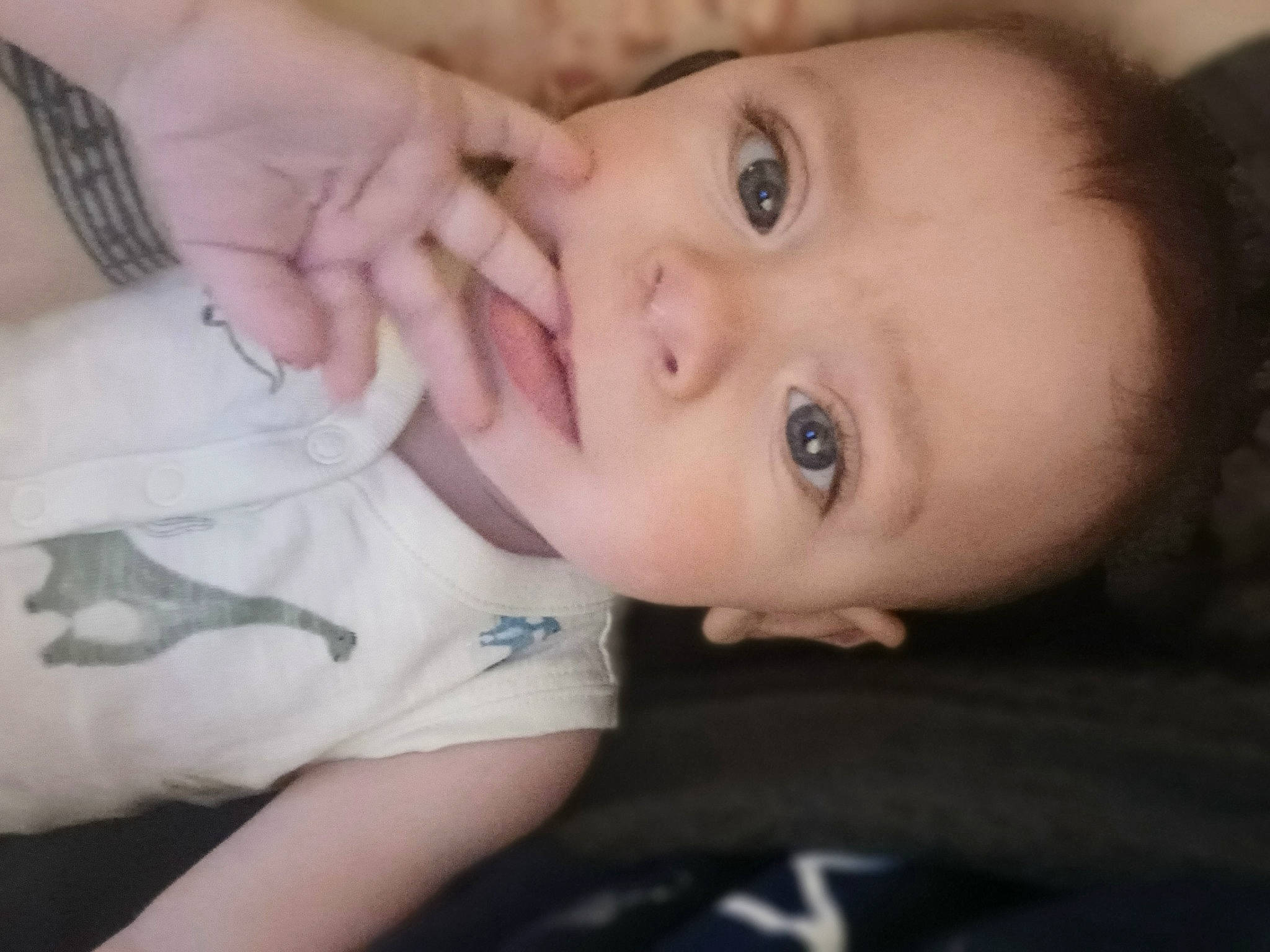 Vincent is registered to the contest to win money with this photo: baby, baby_toddler_clothing, cheek, chin, ear, eye, eyebrow, eyelash, forehead, gesture, happy, iris, jaw, lip, mouth, neck, nose, person, skin, sleeve