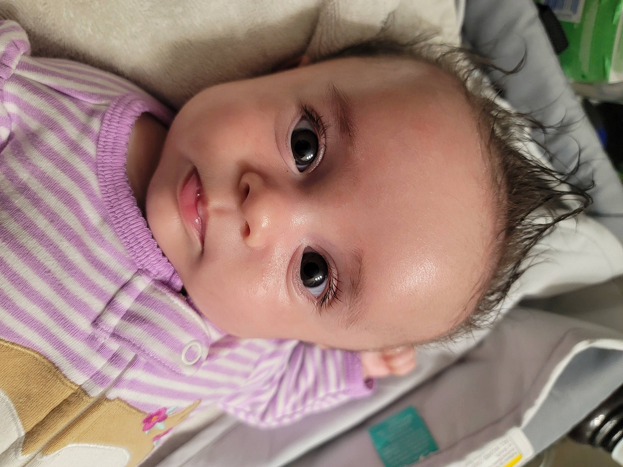 Charleigh is registered to the contest to win money with this photo: baby, cheek, chin, ear, eye, eyebrow, eyelash, face, facial_expression, head, human, iris, lip, mammal, mouth, nose, organ, person, product, skin