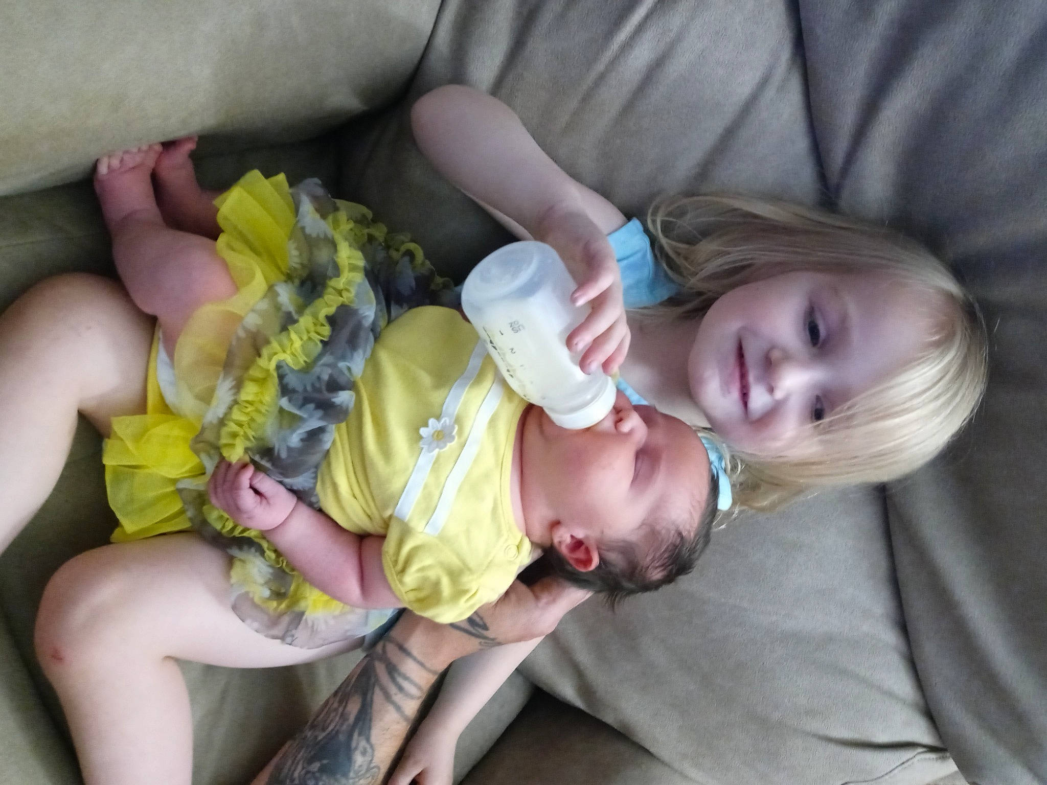 Cerenity is registered to the contest to win money with this photo: baby, baby_toddler_clothing, cheek, comfort, dress, eye, facial_expression, finger, hairstyle, head, iris, joy, leg, mammal, mouth, organ, person, product, skin, textile