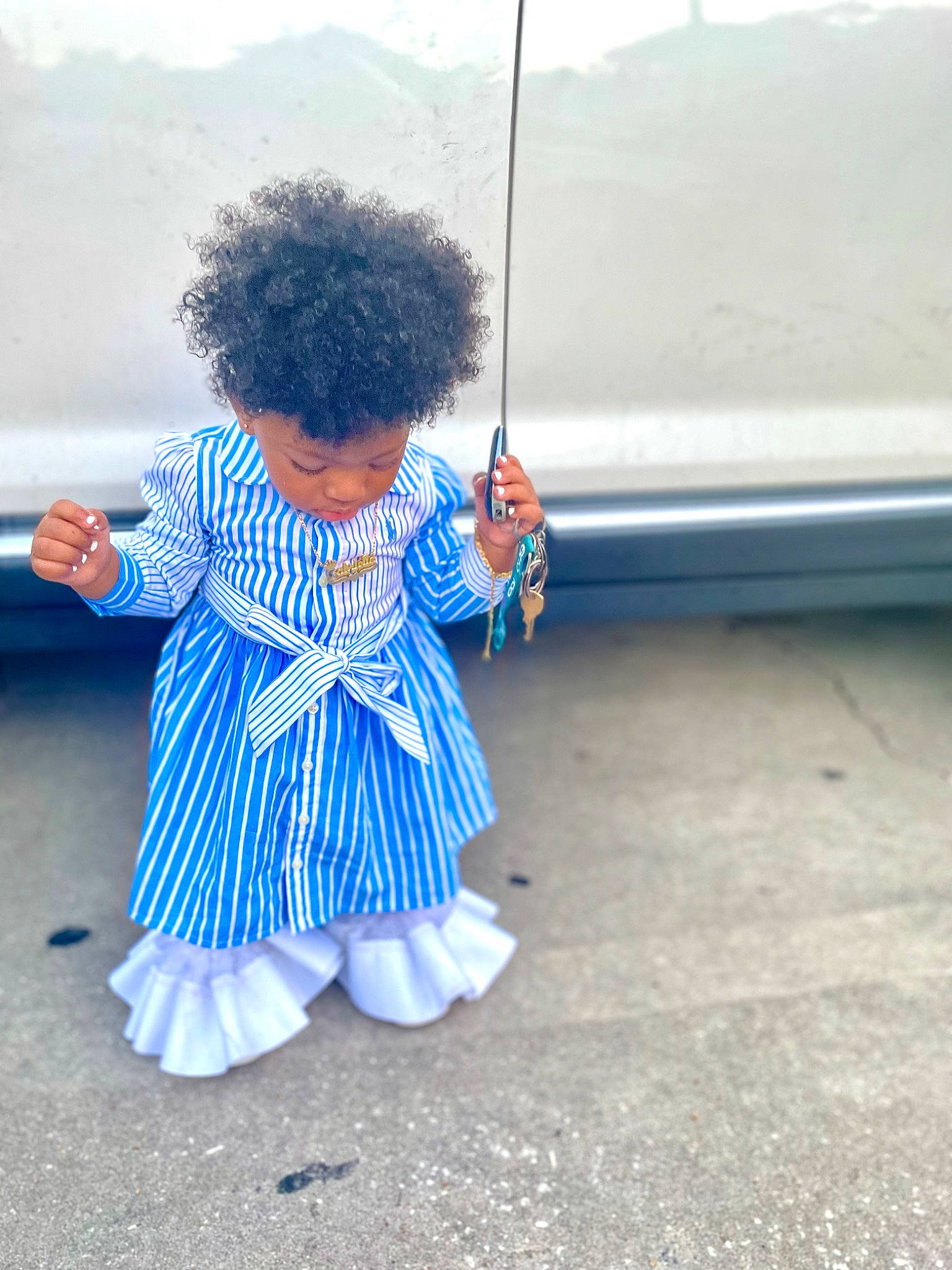 Gabrielle Holmes joined the competition — help win amazing prizes! azure, baby, baby_toddler_clothing, child, electric_blue, fashion_accessory, fun, grass, happy, headgear, human_leg, landscape, leisure, pattern, person, recreation, road, sitting, sky, toddler