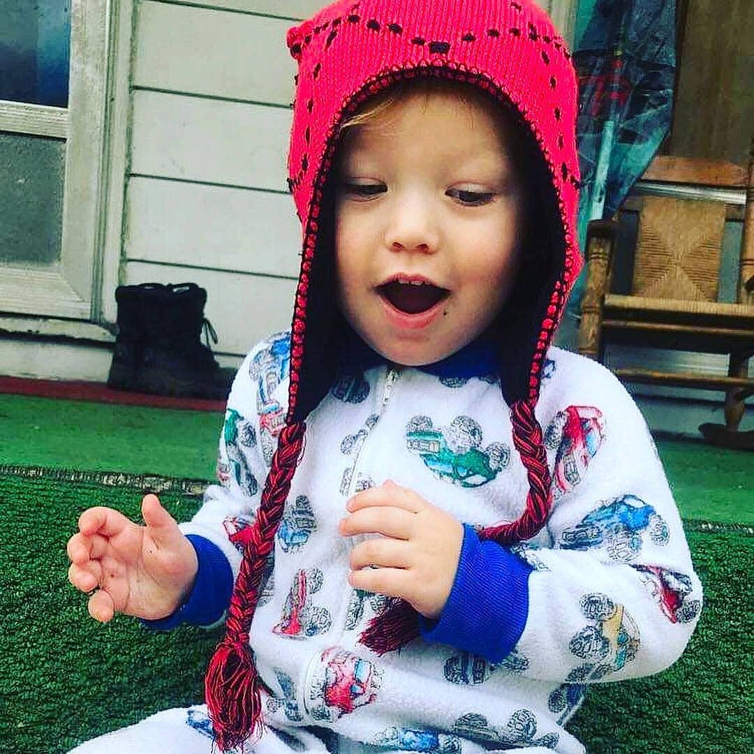 Brice joined the competition — help win amazing prizes! beanie, cap, child, girl, headgear, infant, knit_cap, person, product, smile, textile, toddler