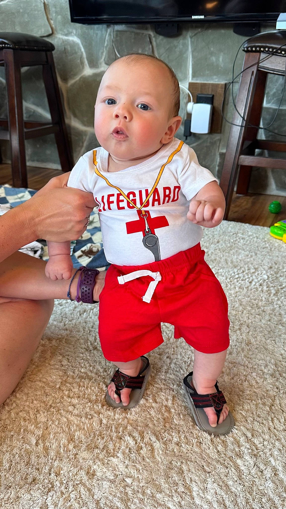 Michael joined the competition — help win amazing prizes! baby, baby_toddler_clothing, carmine, chair, cheek, child, flooring, foot, fun, happy, human_leg, knee, person, sandal, sitting, skin, sleeve, thigh, toddler