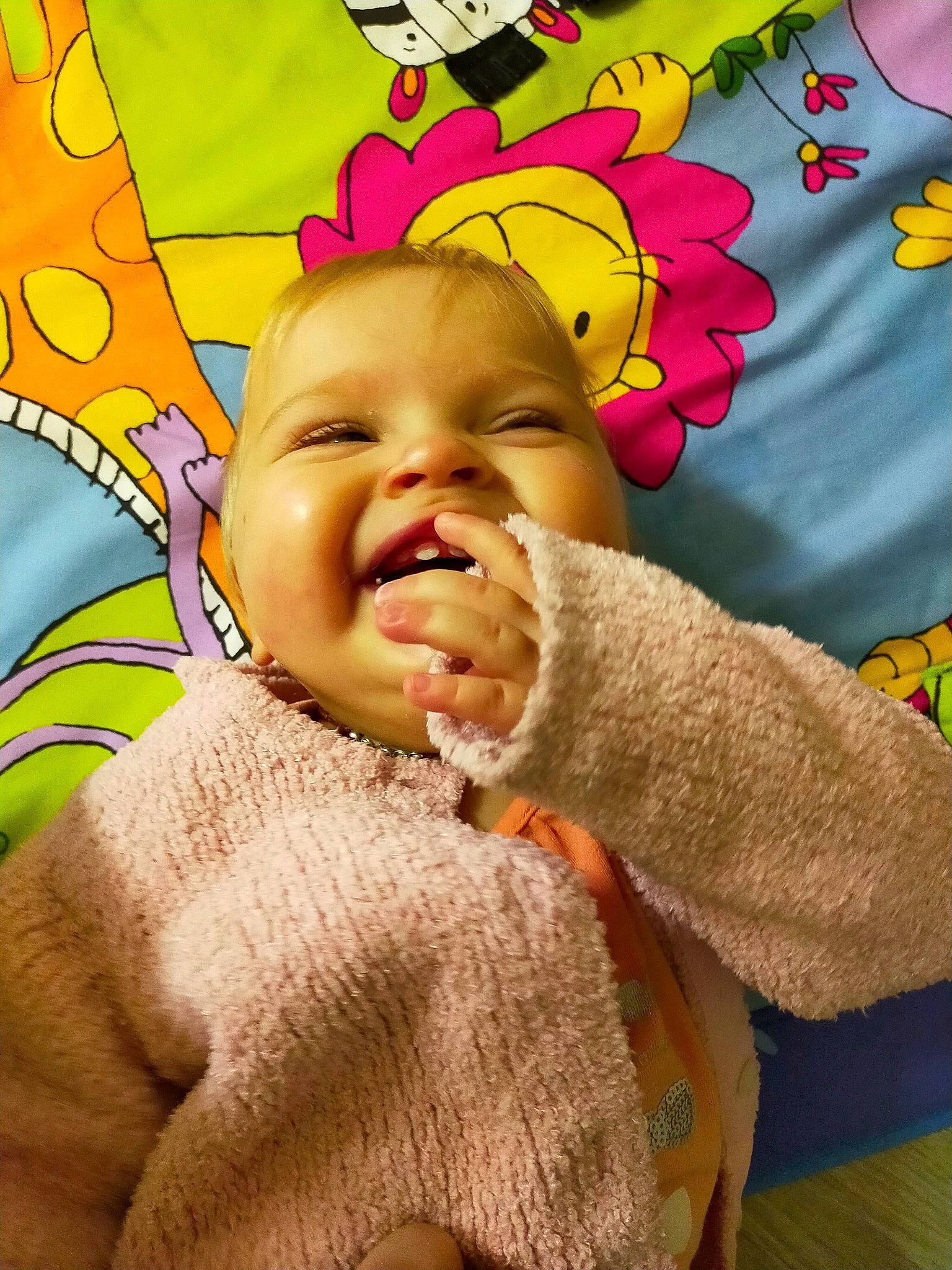 Yvanna participe au concours pour gagner de l'argent avec cette photo : baby, baby_products, baby_toddler_clothing, cheek, child, chin, close_up, event, eyebrow, fun, gesture, happy, linens, magenta, nose, pattern, person, skin, sleeve, smile