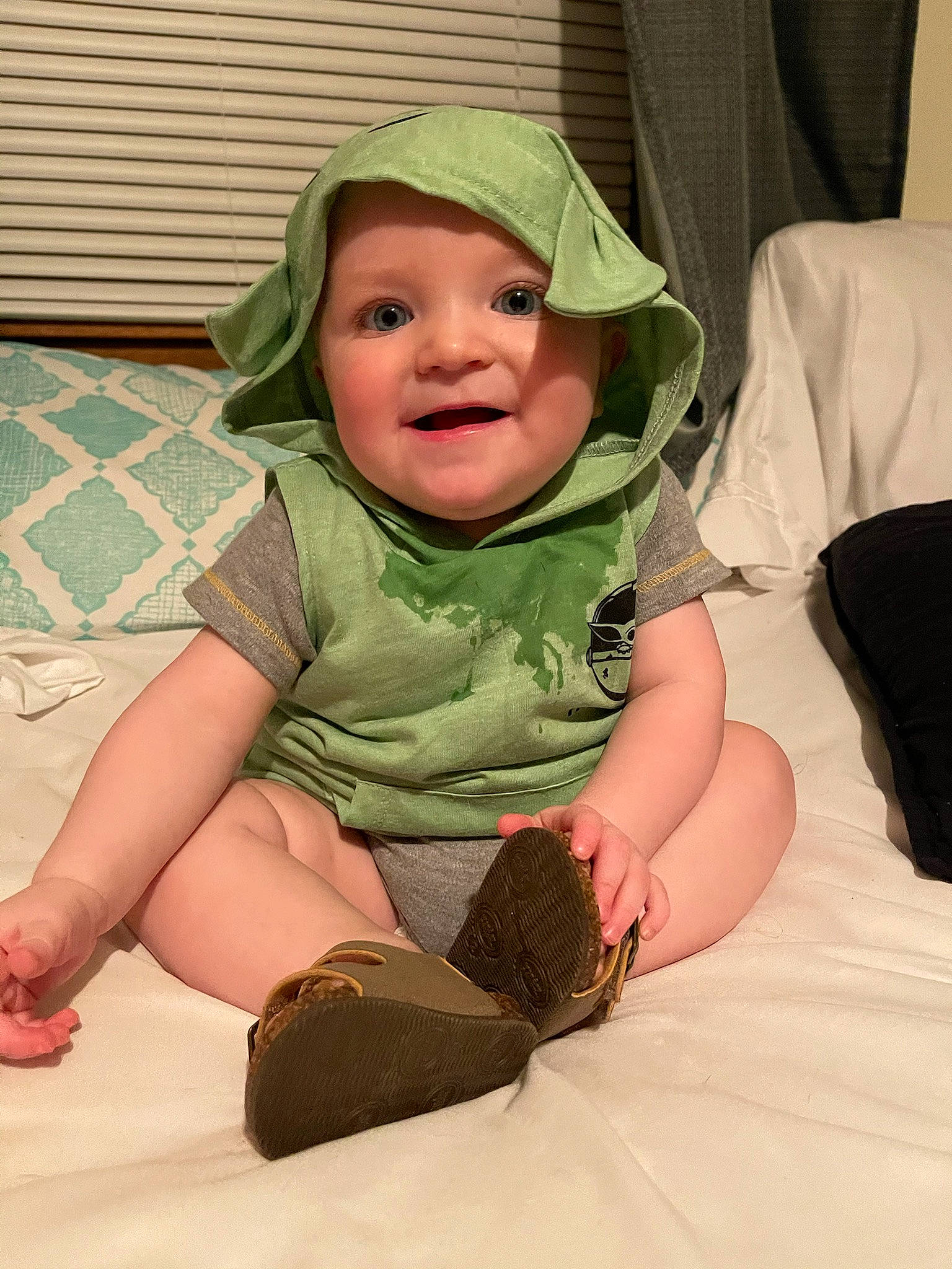 Kooper joined the competition — help win amazing prizes! arm, baby, baby_toddler_clothing, cap, child, comfort, finger, flooring, fun, gesture, hand, happy, headgear, headwear, human_leg, knee, linens, person, room, smile