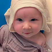 Ellie joined the competition — help win amazing prizes! baby, towel, hood, blue_eyes, water, bath, cute, child, skin, face, portrait, soft, wrapped, indoors, smile, infant, person, young, headwear, closeup