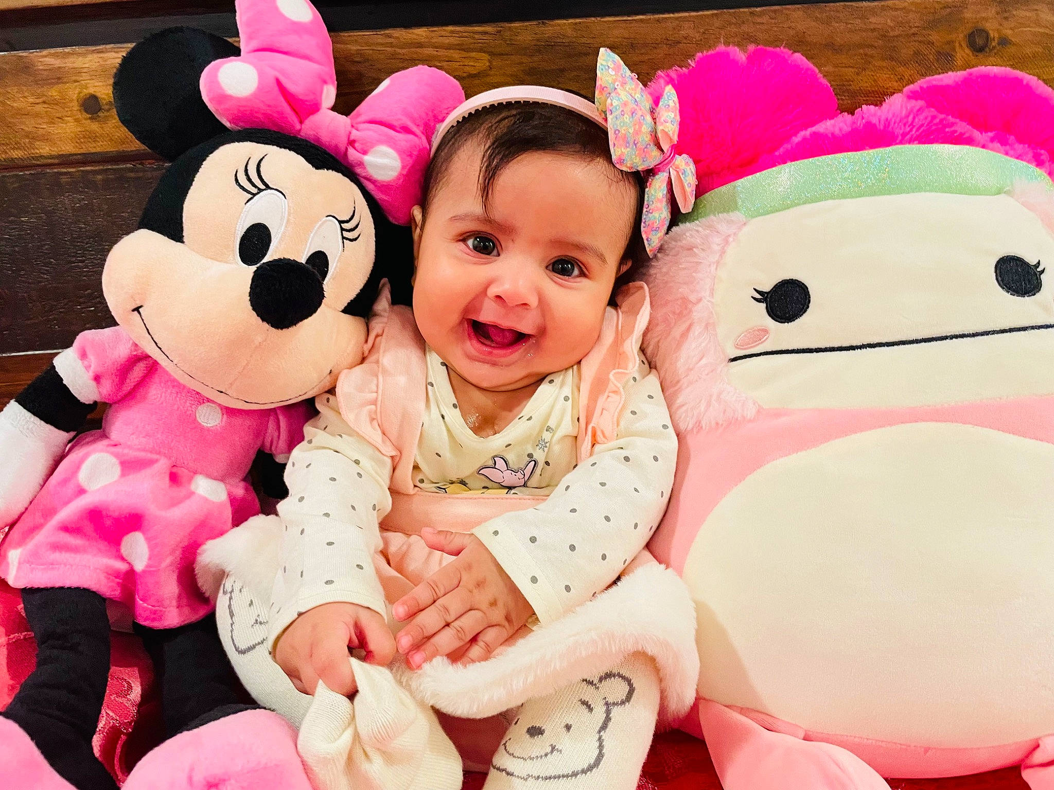Seher is registered to the contest to win money with this photo: baby_toddler_clothing, cheek, child, facial_expression, friendship, fun, gesture, happy, interaction, mammal, person, pink, playing_with_kids, skin, sleeve, smile, textile, toddler, toy, vertebrate