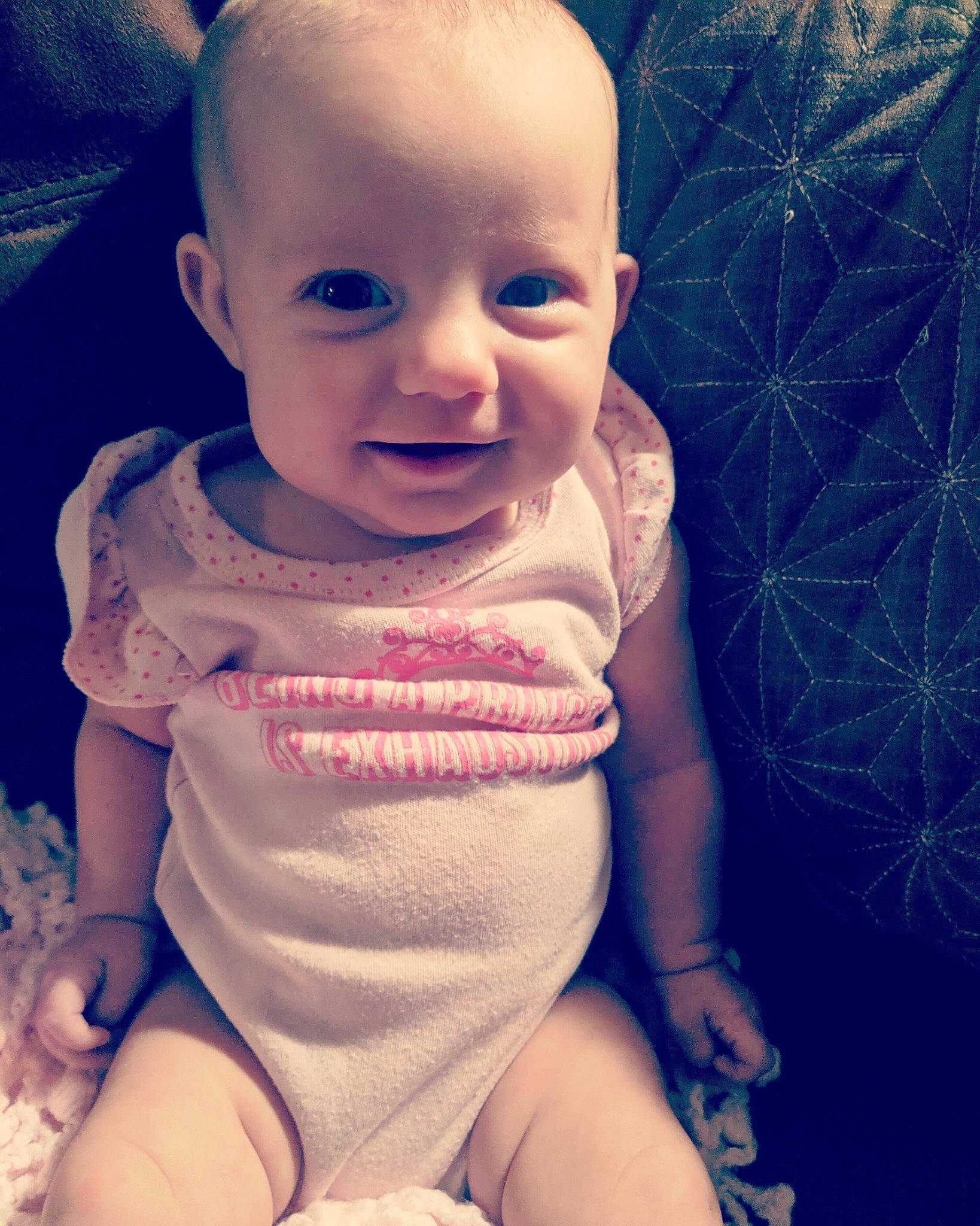 Lilith is registered to the contest to win money with this photo: baby, baby_making_funny_faces, cheek, child, chin, cloud, cool, eye, face, facial_expression, hand, head, human, lip, mouth, nose, person, pink, skin, smile