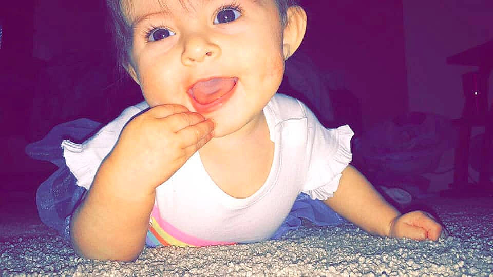 Kiera is registered to the contest to win money with this photo: baby, beauty, cheek, child, chin, eye, face, facial_expression, finger, fun, happy, head, lip, mouth, nose, person, pink, skin, smile, toddler