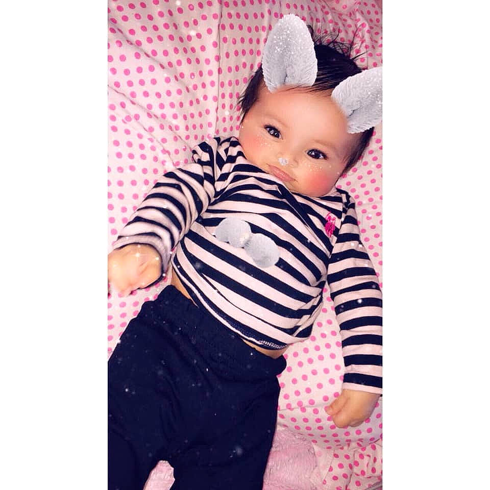 Kiera is registered to the contest to win money with this photo: baby_toddler_clothing, child, design, ear, fawn, pattern, person, pink, product, sleeve, stuffed_toy, toddler, toy