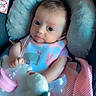baby, infant, bib, bottle, plush_toy, blanket, seat, cushion, clothing, cute, child, indoors, soft, comfort, portrait, feeding, pink, striped_blanket, newborn, resting