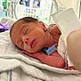 Daniel is registered to the contest to win money with this photo: newborn, baby, hospital, incubator, sleeping, feeding_tube, blanket, medical, infant, fragile, care, rest, child, cute, patient, healthcare, closeup, portrait, tender, peaceful