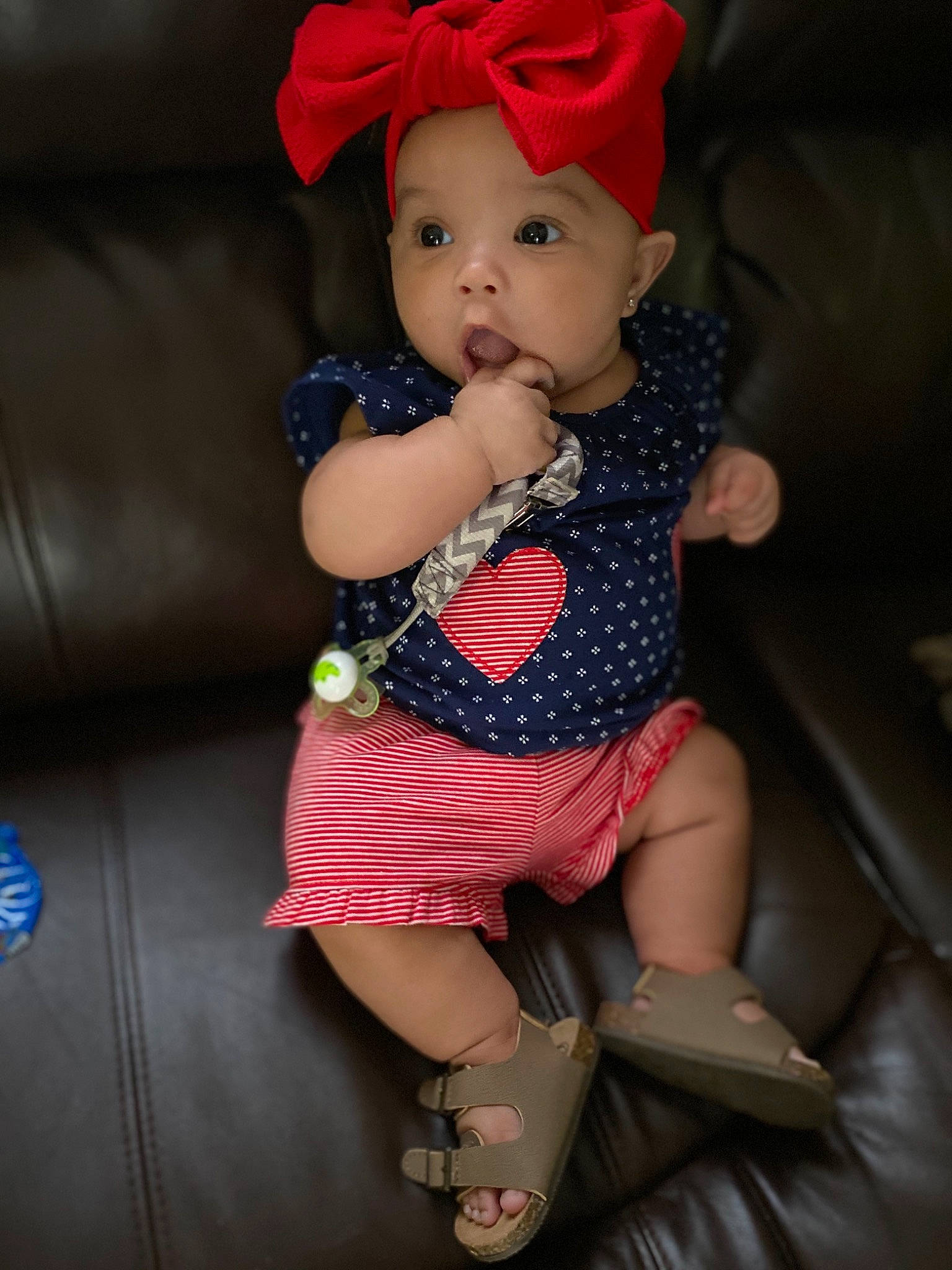 Ava Grace is registered to the contest to win money with this photo: baby, baby_toddler_clothing, beauty, cheek, child, child_model, eye, headgear, headwear, iris, lip, person, pink, plant, red, skin, smile, surprise, toddler, toy