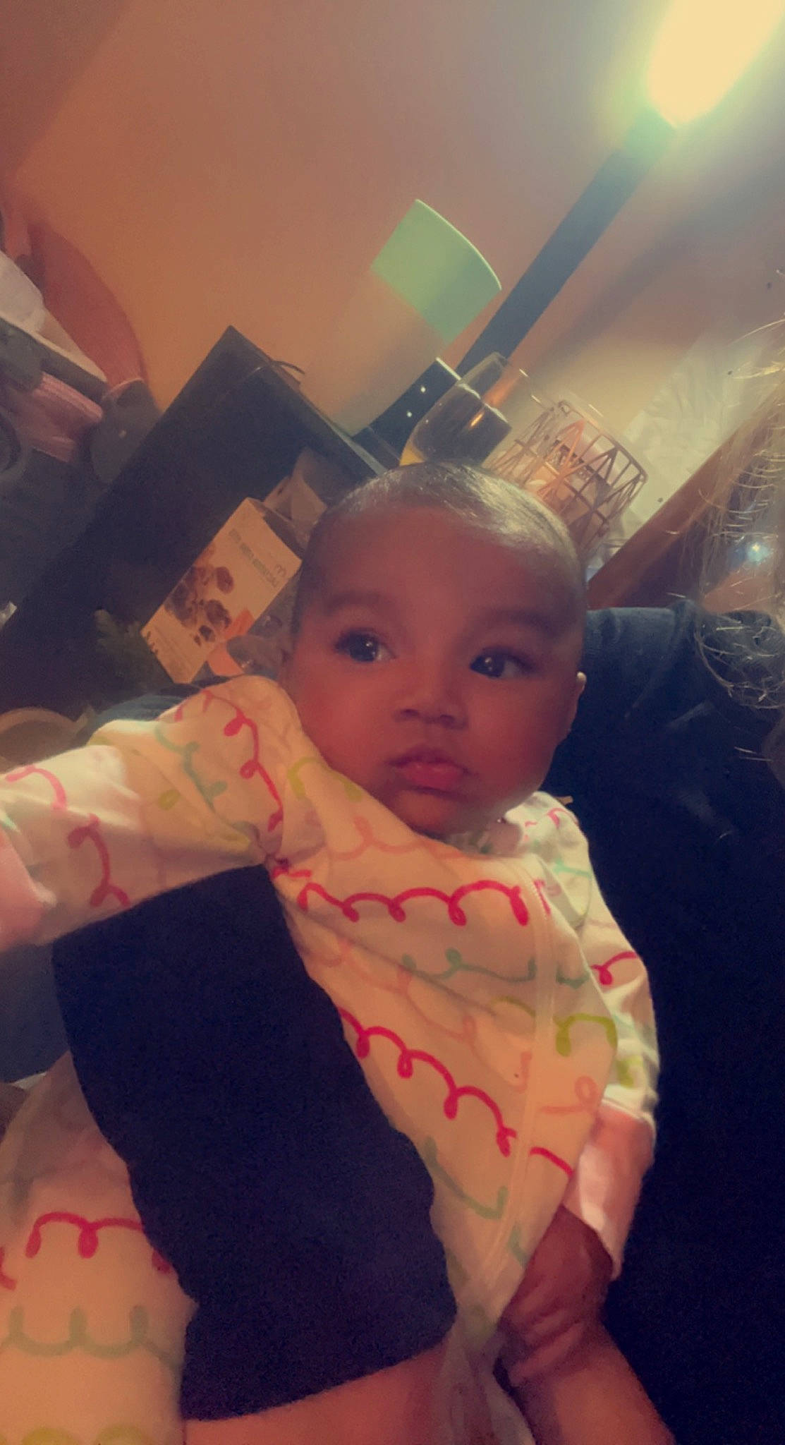 Liberty is registered to the contest to win money with this photo: baby, baby_toddler_clothing, cheek, cloud, comfort, eyebrow, finger, fun, hairstyle, hand, happy, headwear, human_body, iris, lip, mouth, nose, person, shoulder, skin