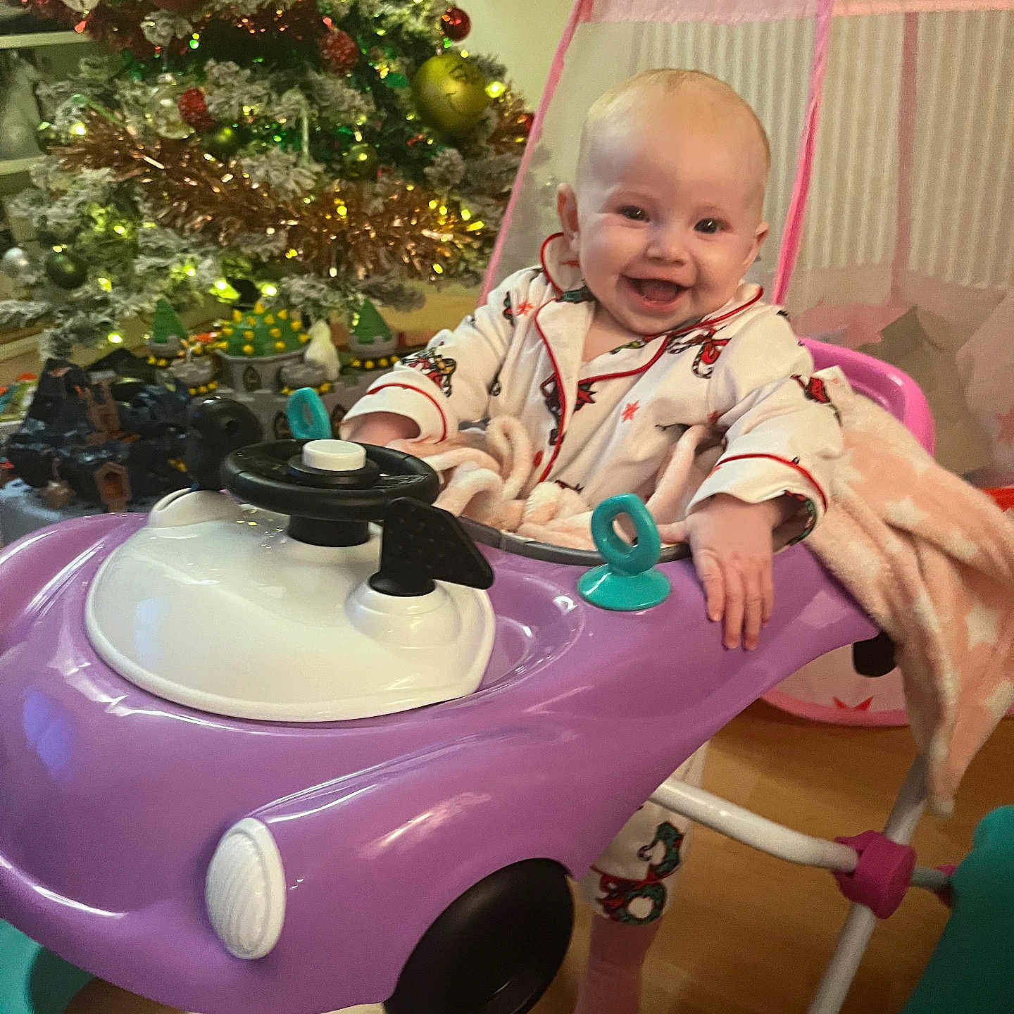 Nova is registered to the contest to win money with this photo: baby, cream, dessert, face, flower, food, furniture, happy, head, icing, indoors, lighting, person, photography, plant, portrait, pottedplant, pottery, table, tree