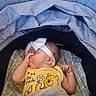 adorable, baby, blanket, child, cozy, cute, headband, indoor, infant, nap, peaceful, person, resting, sleeping, soft_fabric, stroller, thumb_sucking, toddler, winnie_the_pooh, yellow_shirt