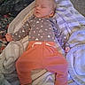 baby, blanket, child, clothing, comfort, cozy, cute, floor, grey_top, indoor, infant, patterned_clothing, peaceful, person, pink_pants, relaxed, resting, sleeping, small_hands, soft_texture