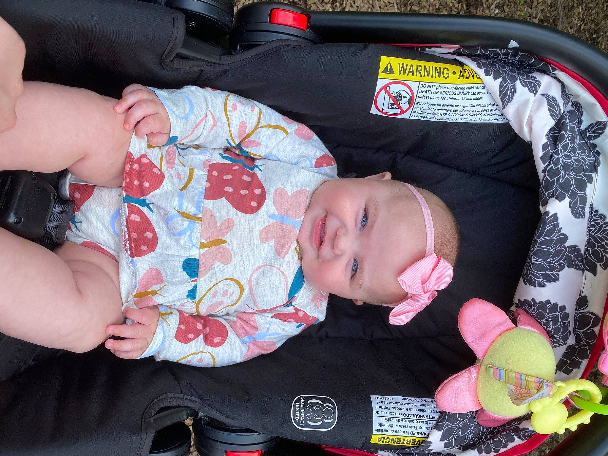 Nina is registered to the contest to win money with this photo: baby, baby_carriage, baby_in_car_seat, baby_products, baby_toddler_clothing, bag, car_seat, cheek, child, comfort, headwear, lap, luggage_and_bags, pattern, person, product, sitting, toddler