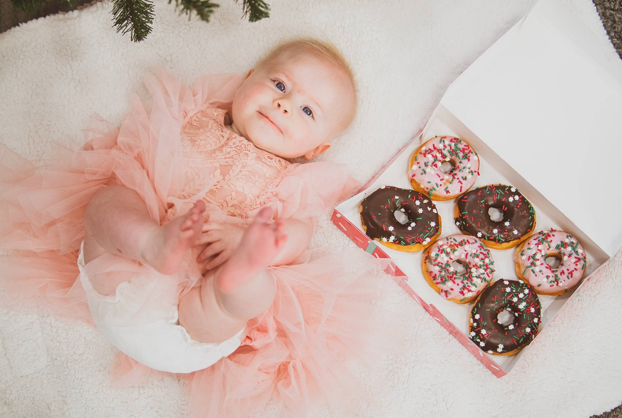 James is registered to the contest to win money with this photo: baby, baby_toddler_clothing, child, dessert, event, fashion_accessory, hair_accessory, happy, headpiece, jewellery, linens, pattern, peach, person, picture_frame, pink, portrait_photography, sitting, smile, sweetness