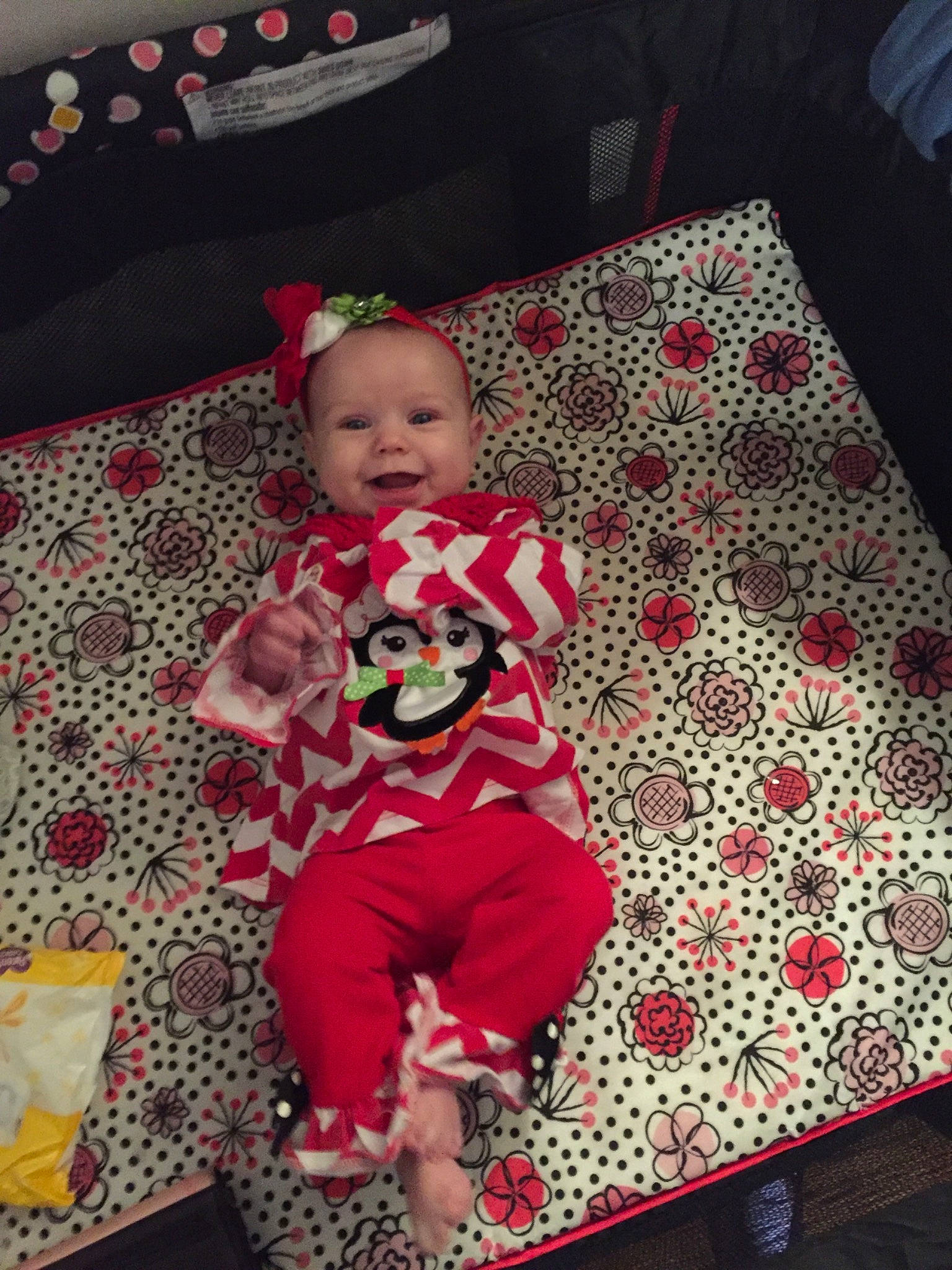 Cheyenne is registered to the contest to win money with this photo: child, christmas, day, design, fun, holiday, infant, linens, material, pattern, person, pink, product, red, textile, toddler