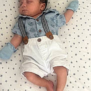 Zyaire joined the competition — help win amazing prizes! baby, sleeping, infant, clothing, shirt, shorts, suspenders, mittens, feet, star_pattern, bed, blanket, cute, peaceful, portrait, indoors, child, resting, young, laying