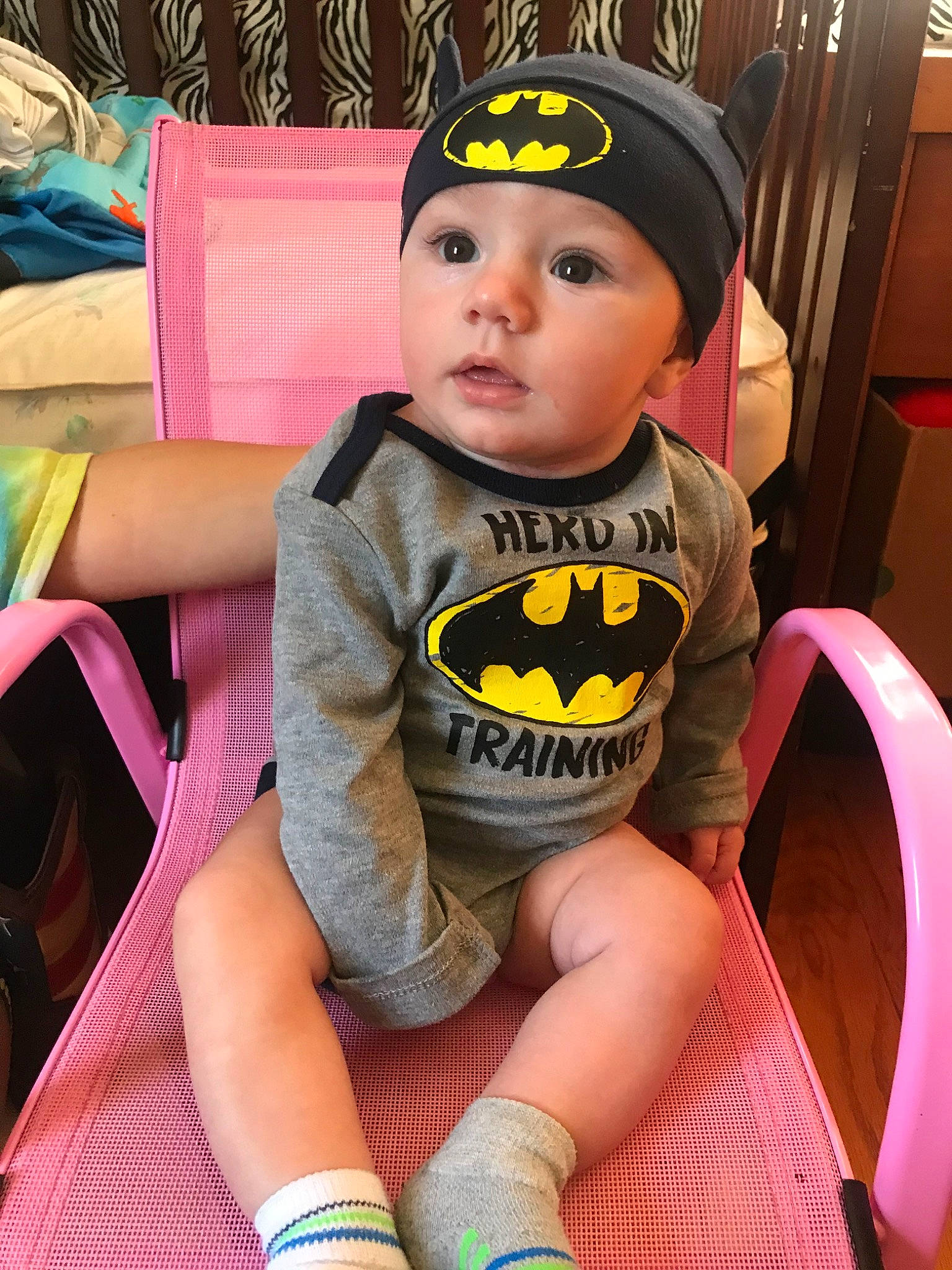 Kaius is registered to the contest to win money with this photo: baby, batman, beanie, cap, child, cool, costume, fictional_character, footwear, head, headgear, headwear, justice_league, leg, mouth, person, product, skin, superhero, surprise