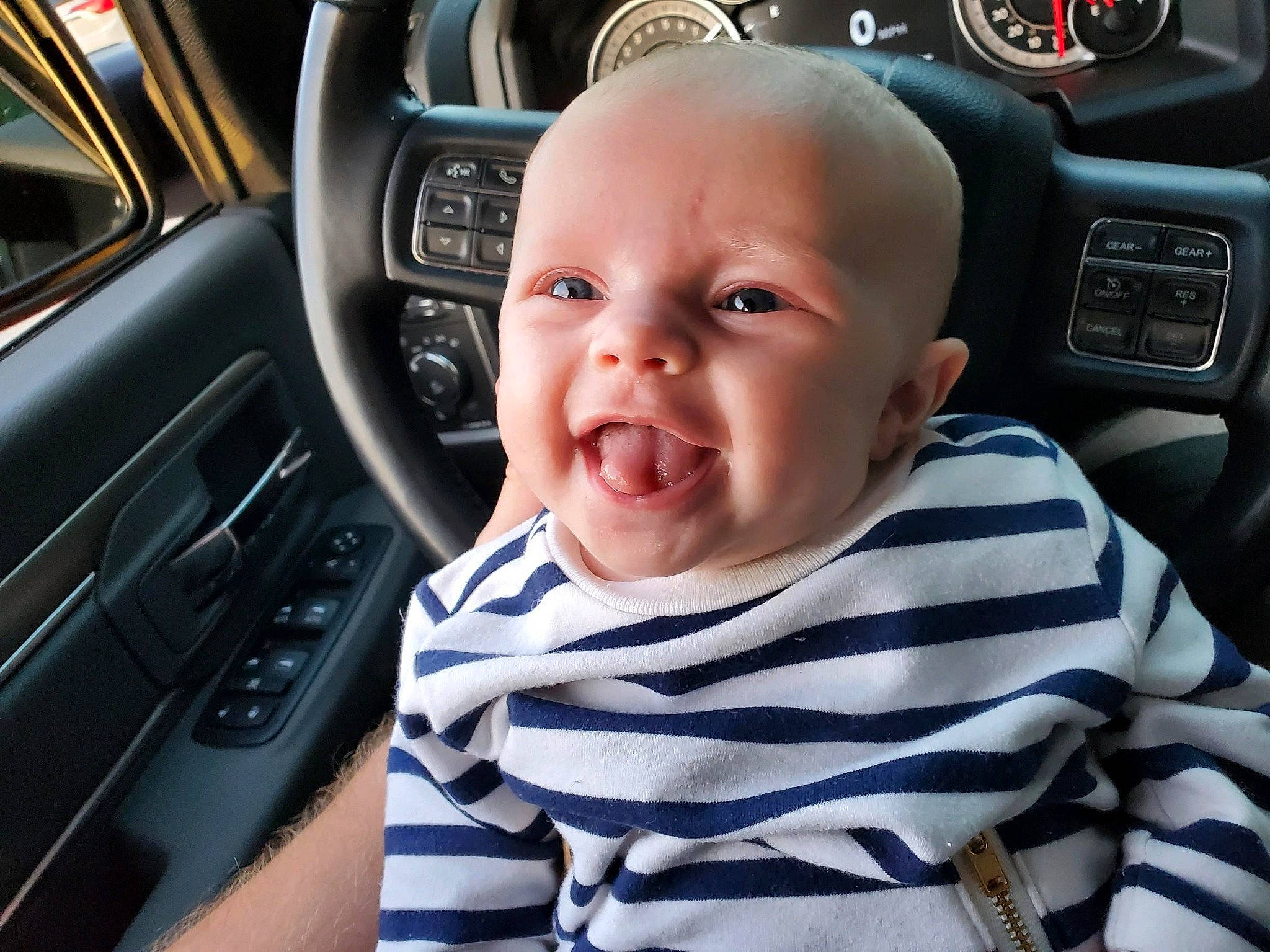 Renna joined the competition — help win amazing prizes! auto_part, baby, car, car_seat, car_seat_cover, child, family_car, head_restraint, person, steering_part, steering_wheel, subcompact_car, toddler, vehicle, vehicle_door