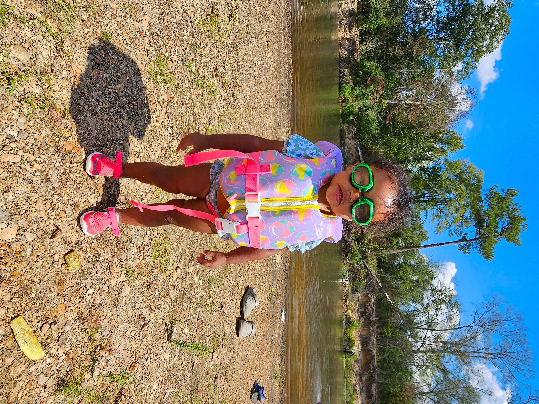 Braelyn joined the competition — help win amazing prizes! child, fun, grass, happy, human_leg, leisure, magenta, people_in_nature, person, plant, recreation, shadow, sky, soil, thigh, tree, trunk, water
