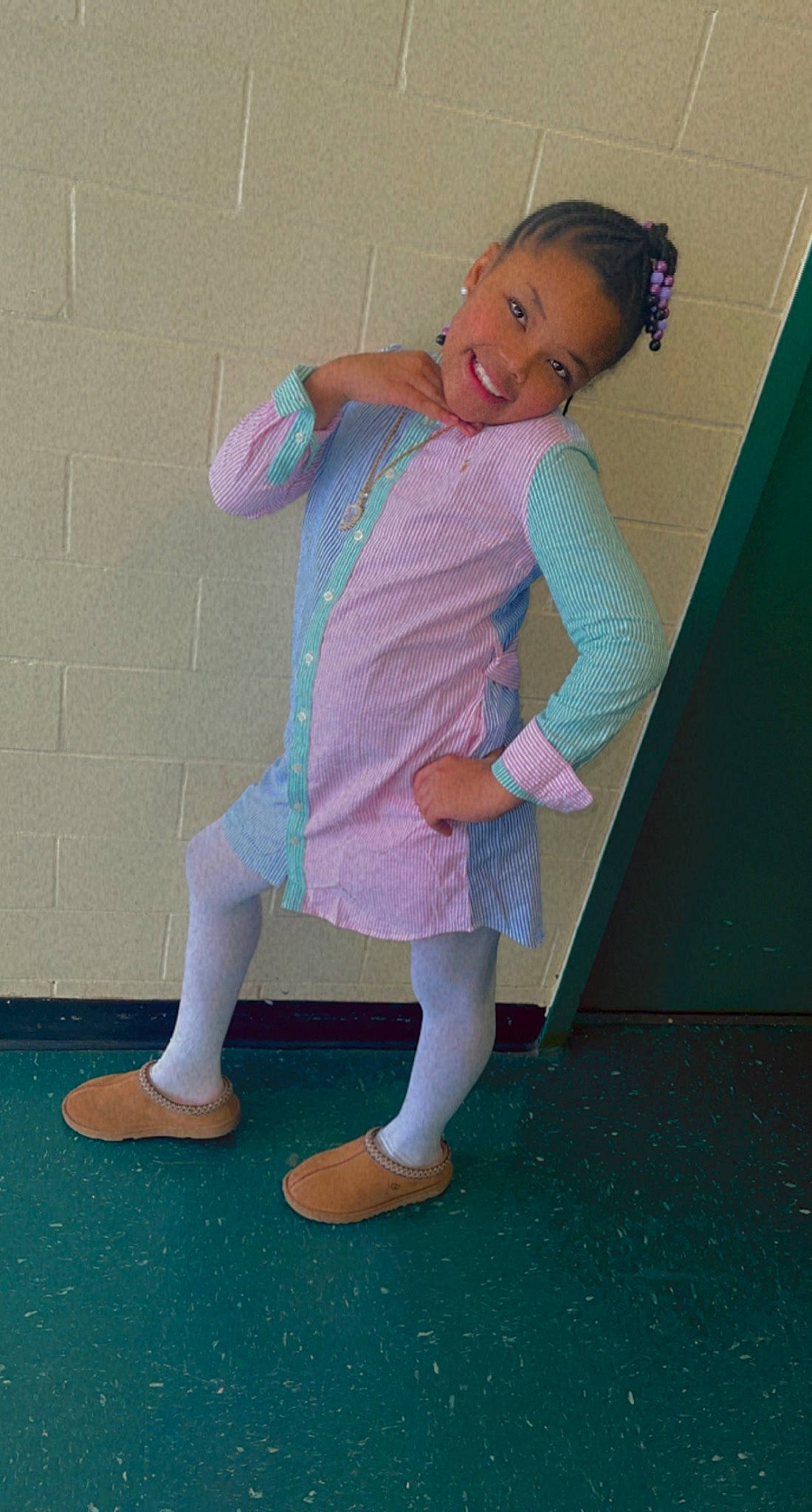 Aubrielle is registered to the contest to win money with this photo: baby_toddler_clothing, barefoot, dress, foot, fun, hair, happy, human_leg, joy, knee, magenta, one_piece_garment, pattern, person, pink, play, sitting, sleeve, smile, sock